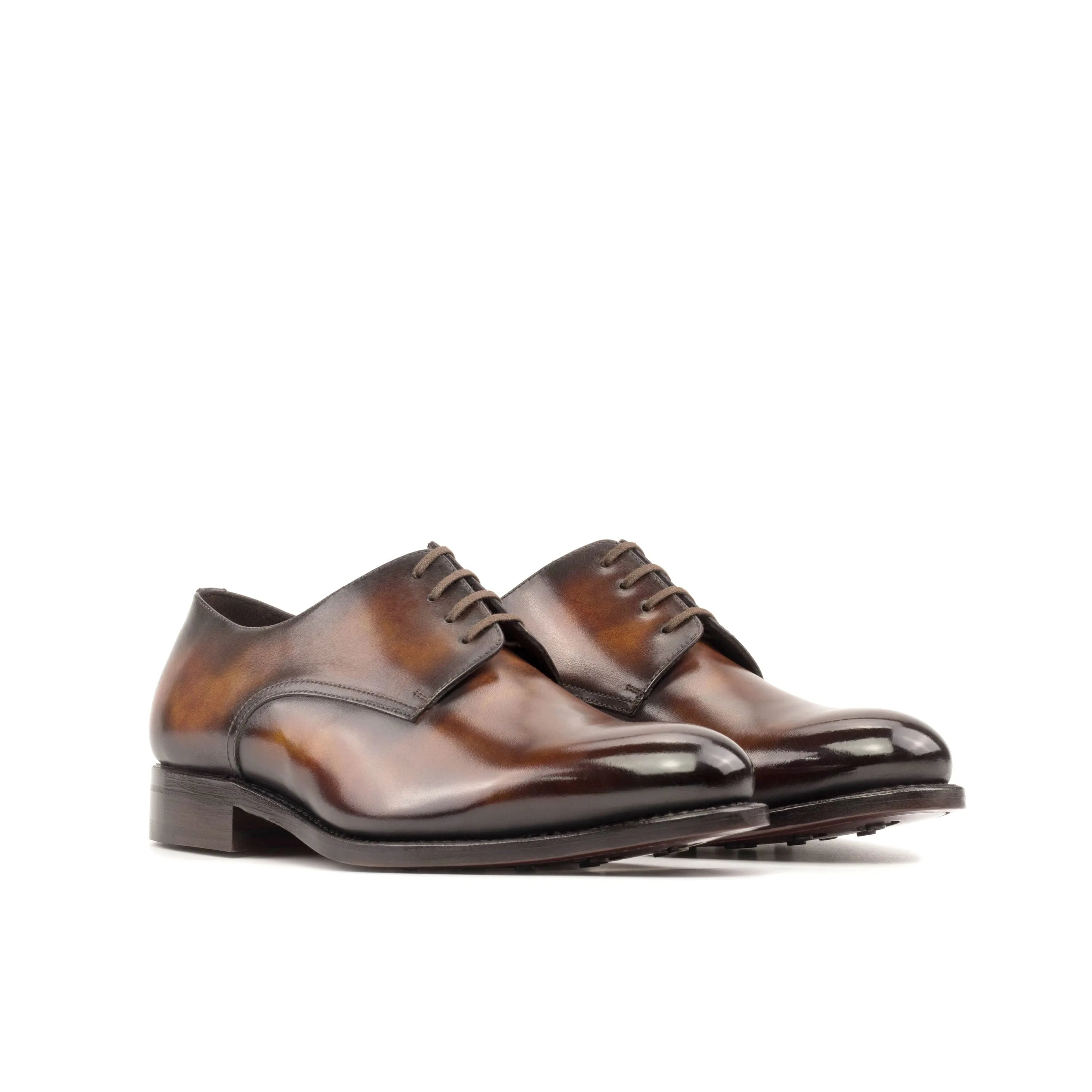 Pair of brown leather Mikeal Patina Derby shoes for a sophisticated look