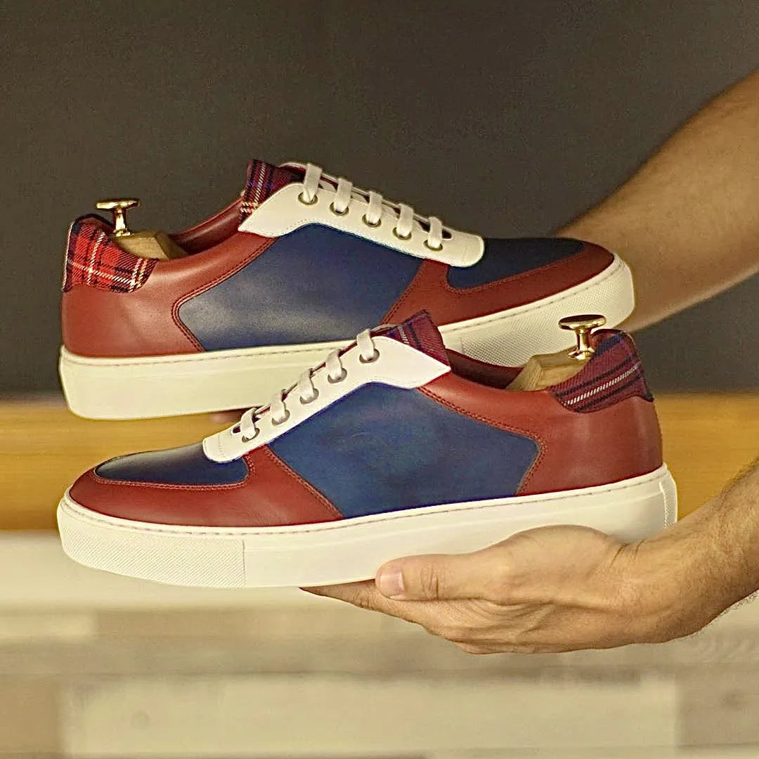 Stylish Milo Low Top Sneaker in red, blue, and white painted calf leather design