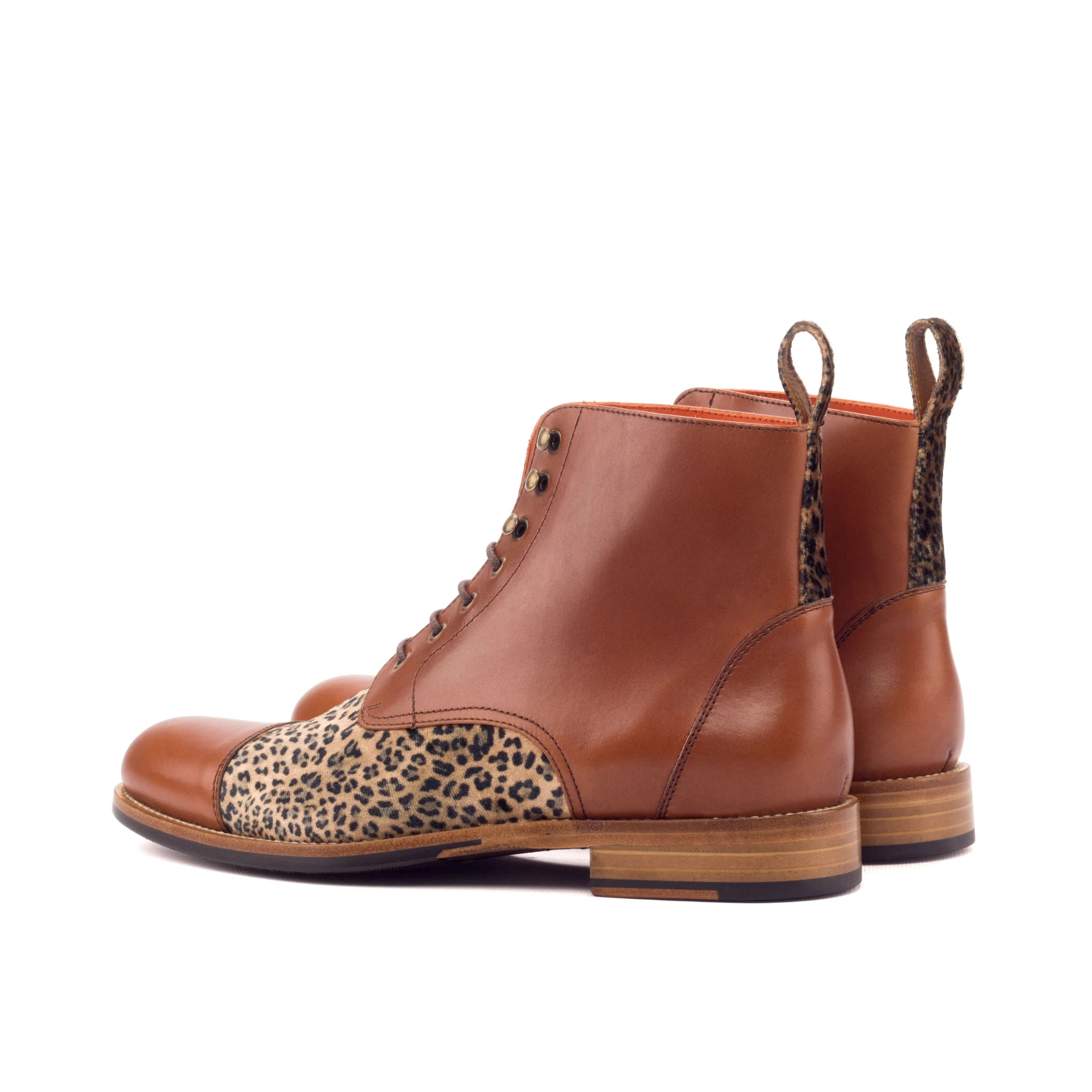 Brown leather Mo Ladies Captoe boots featuring stylish leopard print accents
