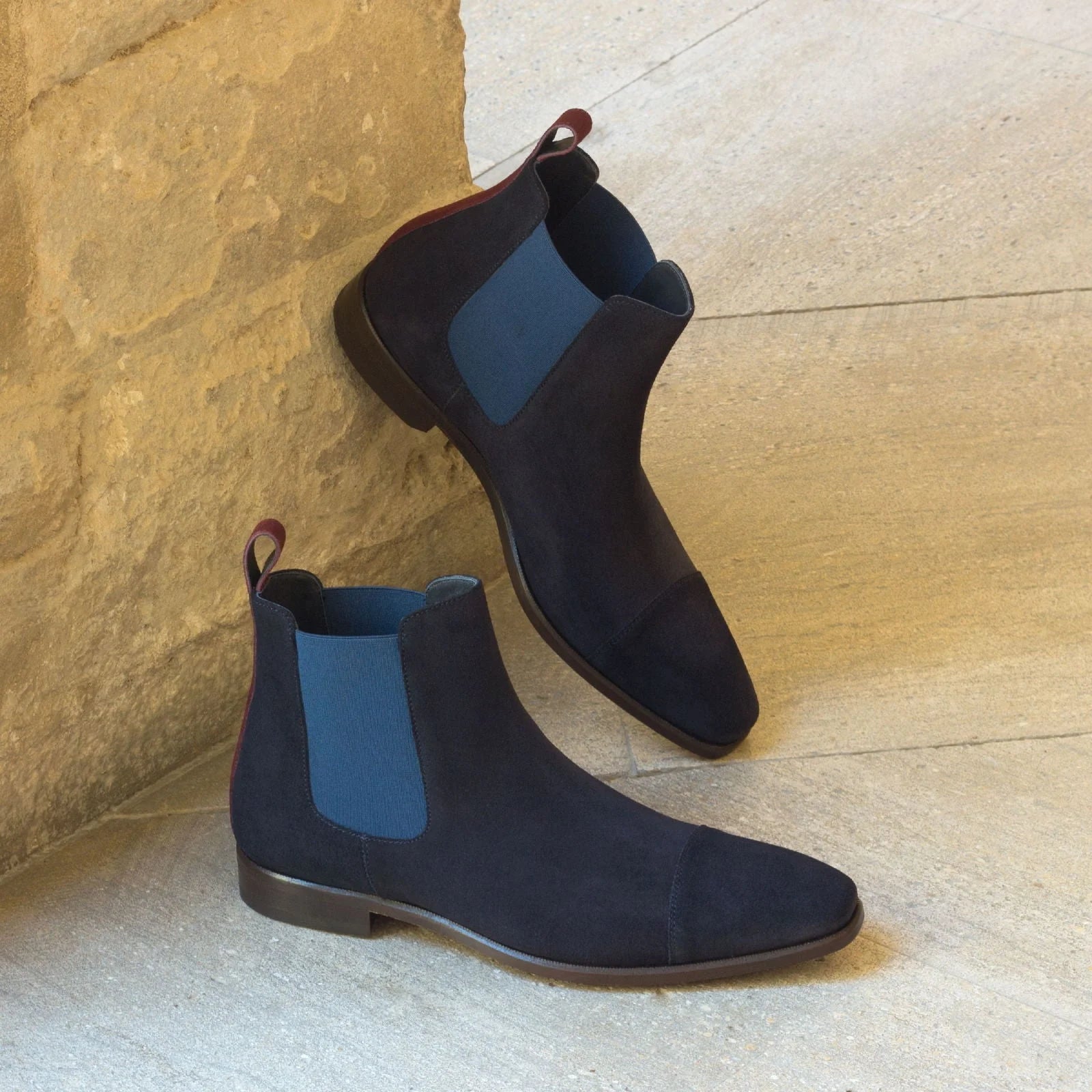 Musko chelsea navy suede boots with navy elastic panels and brown sole