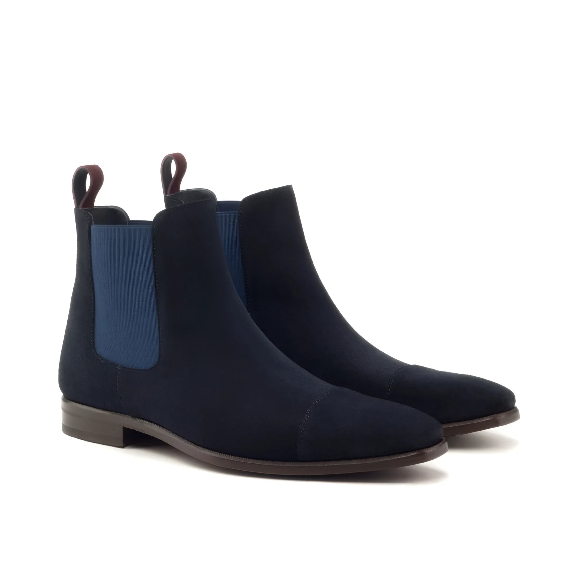 Navy suede Musko Chelsea boots with royal blue panels and brown tabs