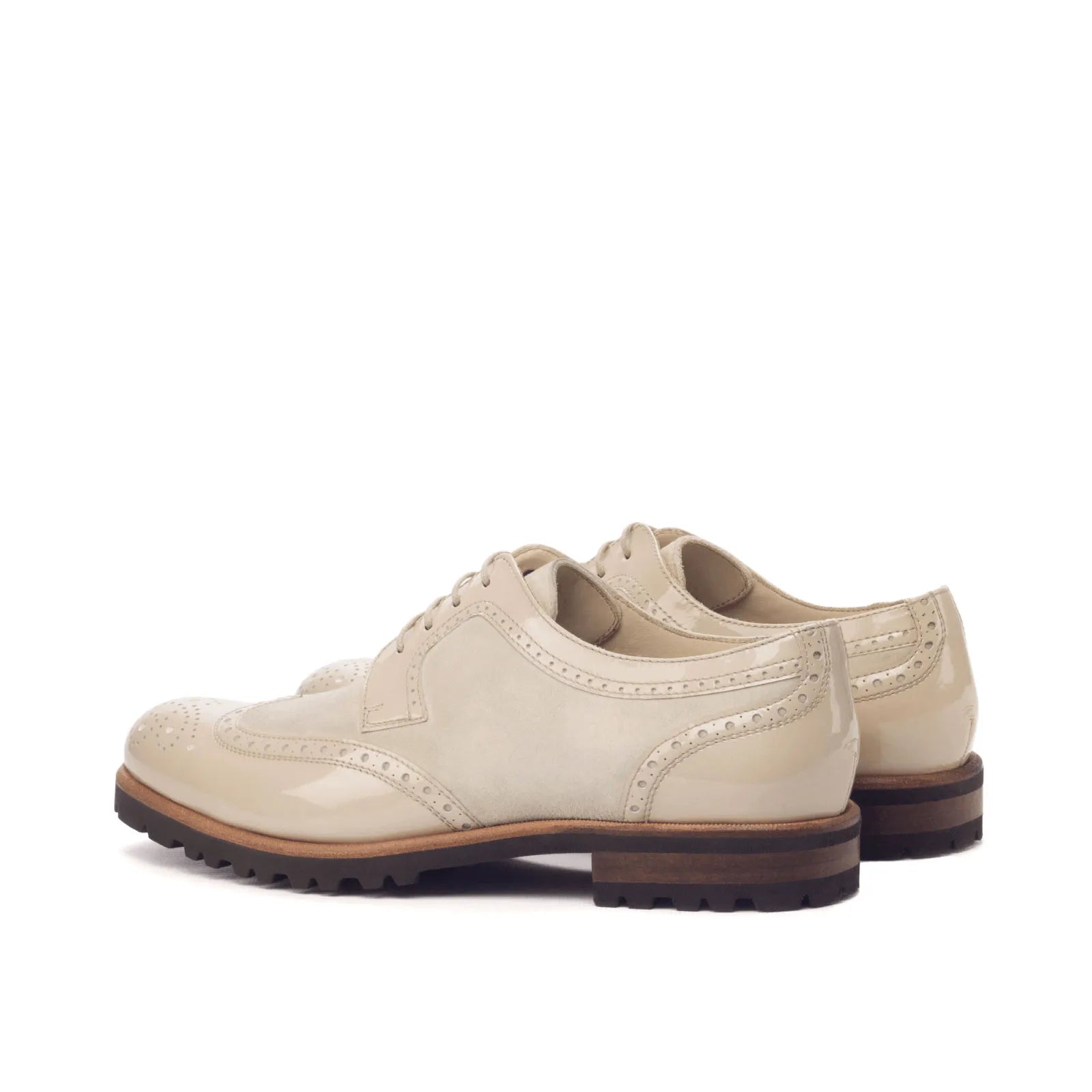 Pair of beige leather Ladies Derby Wingtip shoes, stylish and versatile for every occasion