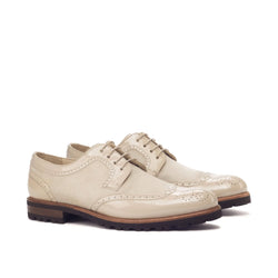 Beige patent leather wingtip shoes from Nana Ladies Derby Wingtip collection