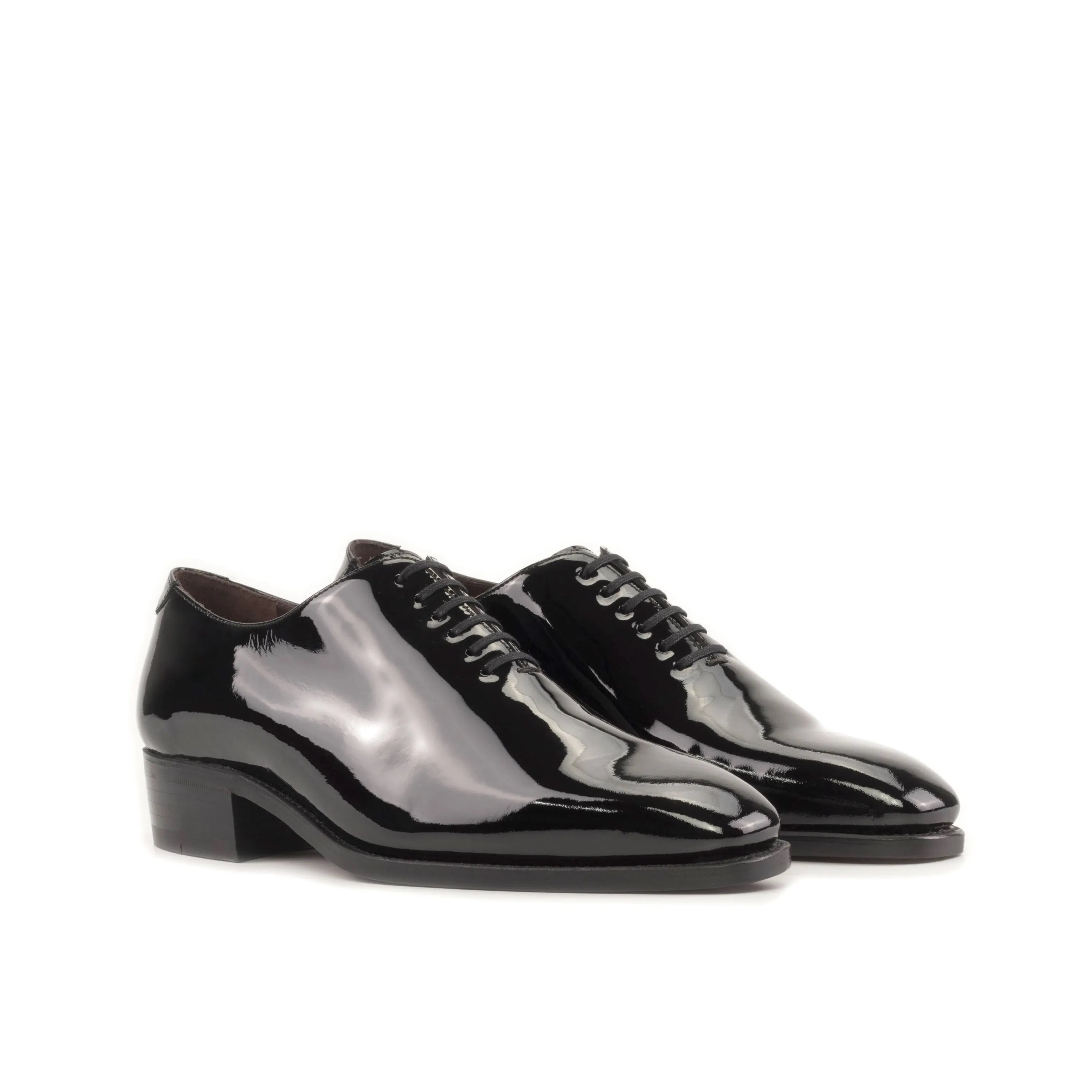 Black patent leather Narciso Wholecut shoes showcasing elegant craftsmanship and style