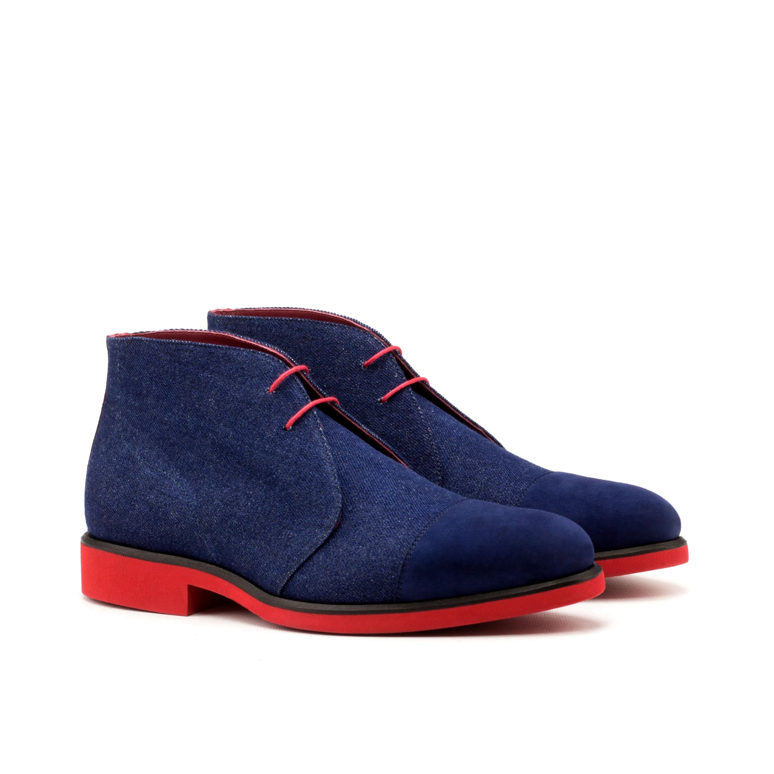 Blue suede Narek Chukkas with distinctive red soles, perfect chukka boots for stylish wear