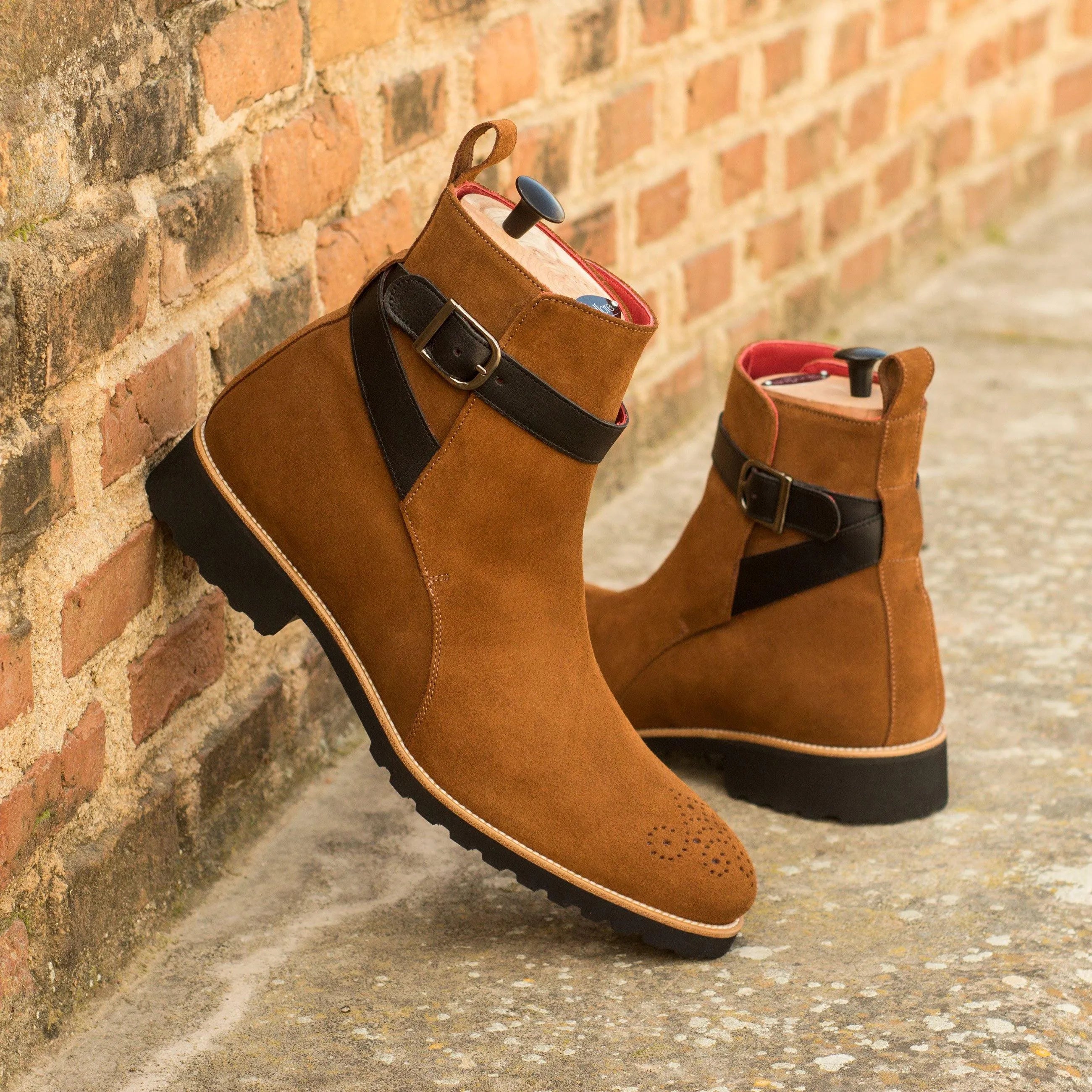 Brown suede Navajo Jodhpur Boots II featuring a stylish black strap for enhanced appeal