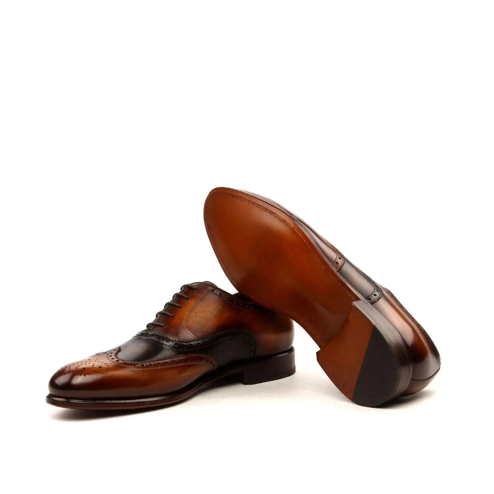 Brown leather dress shoes in NY Full Brogue Patina design showcasing elegant craftsmanship