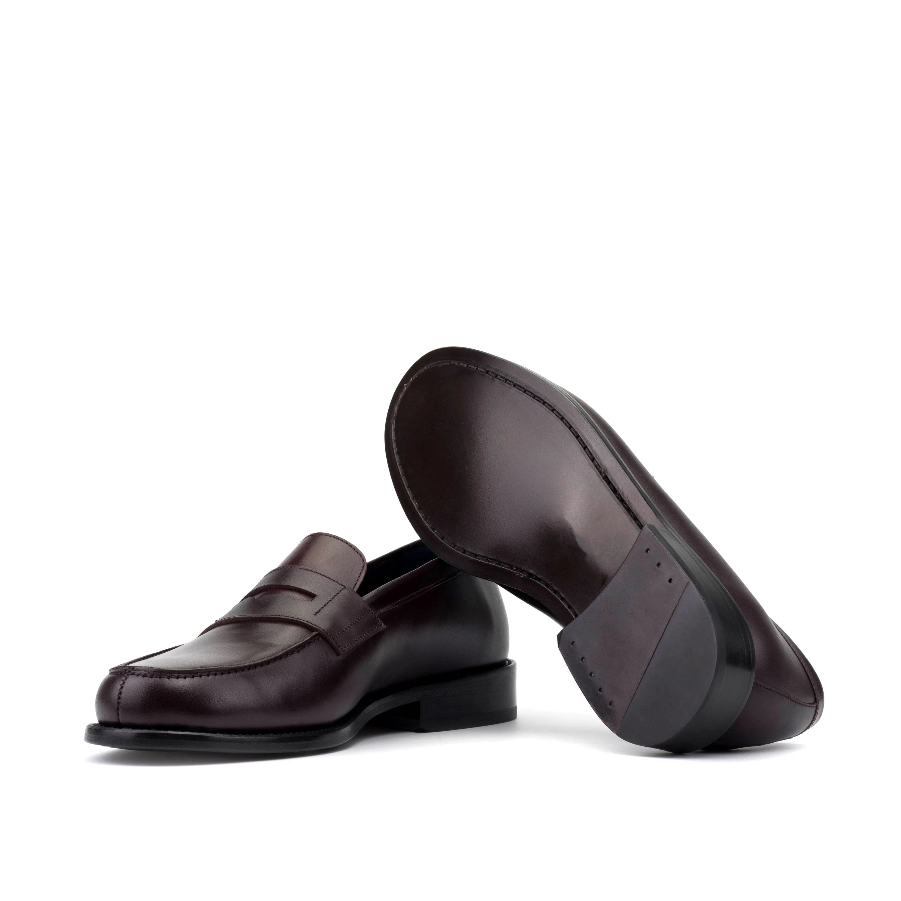 Dark brown office penny loafers with polished leather finish