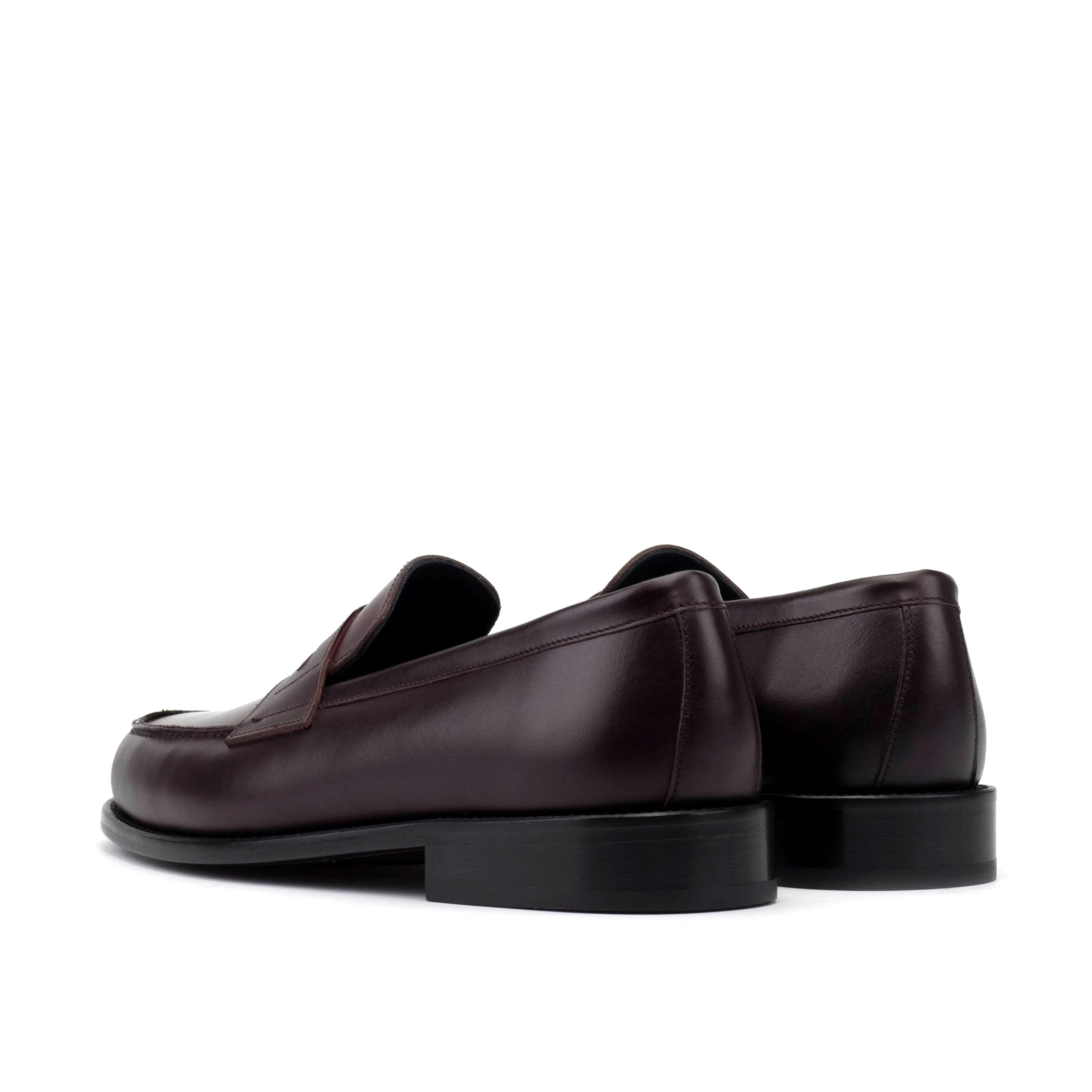 Office penny loafers in dark brown leather with polished finish and black rubber soles