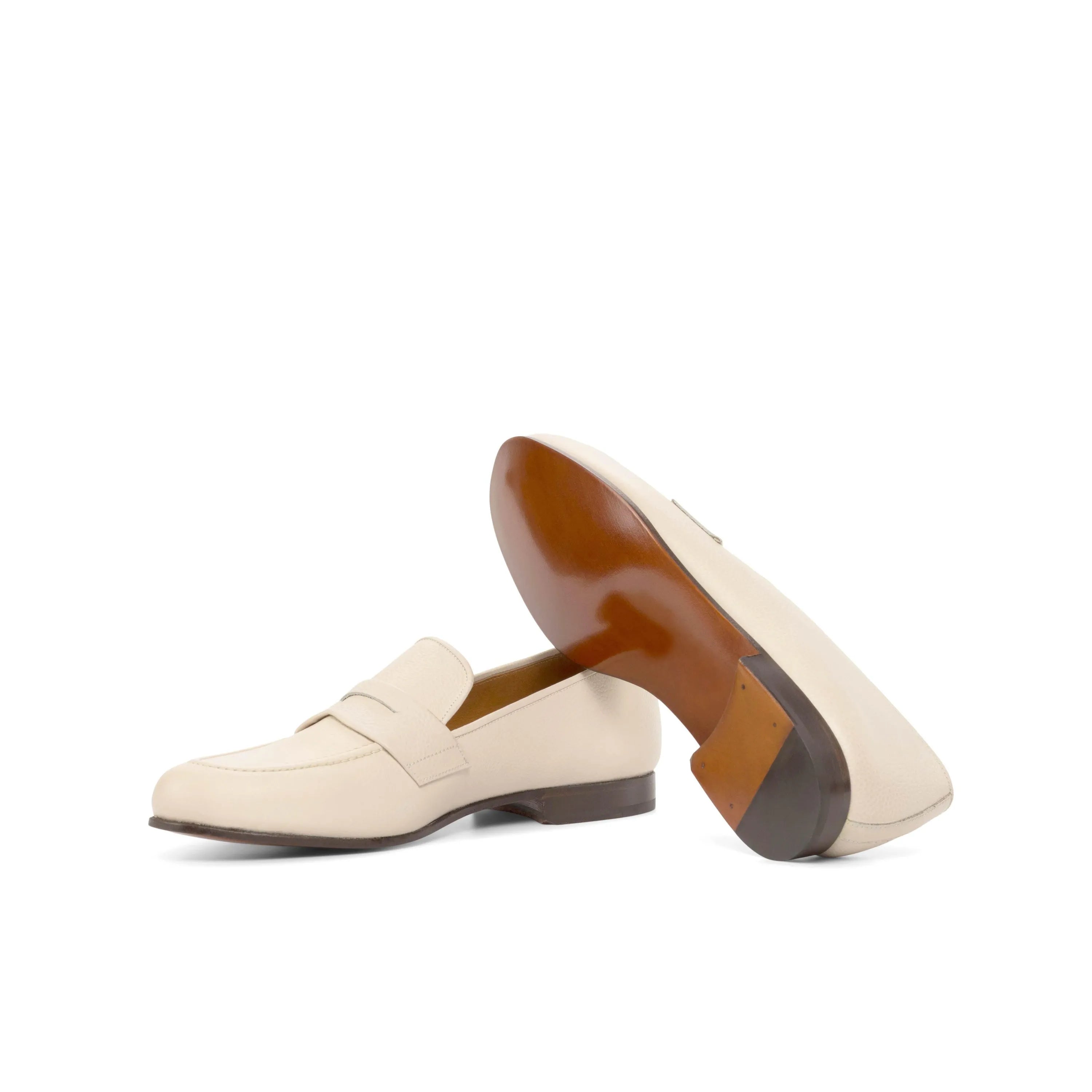Cream-colored leather loafers from the Olgo Wellington slip collection