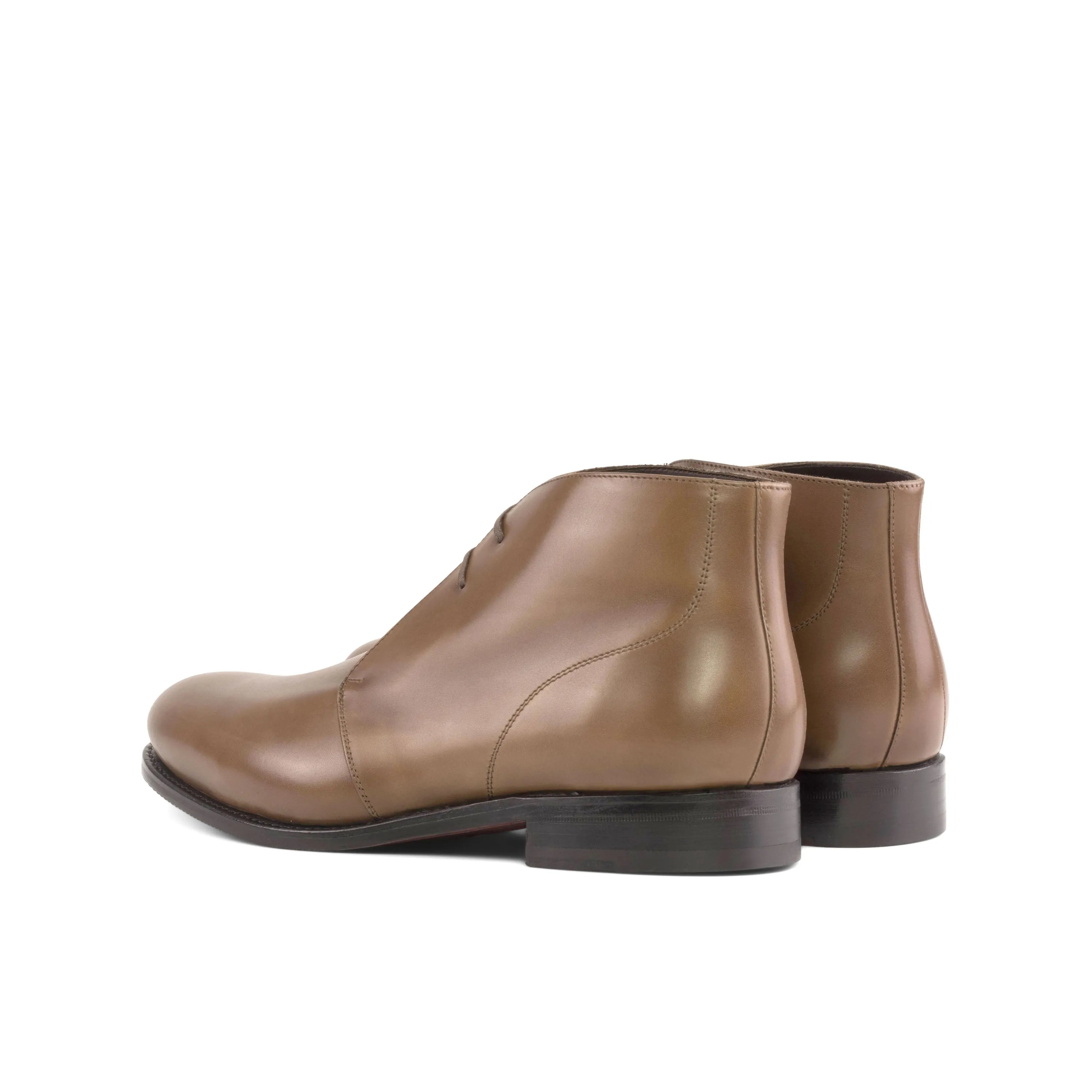 Pair of brown leather Olian Chukka boots for a stylish and sophisticated look