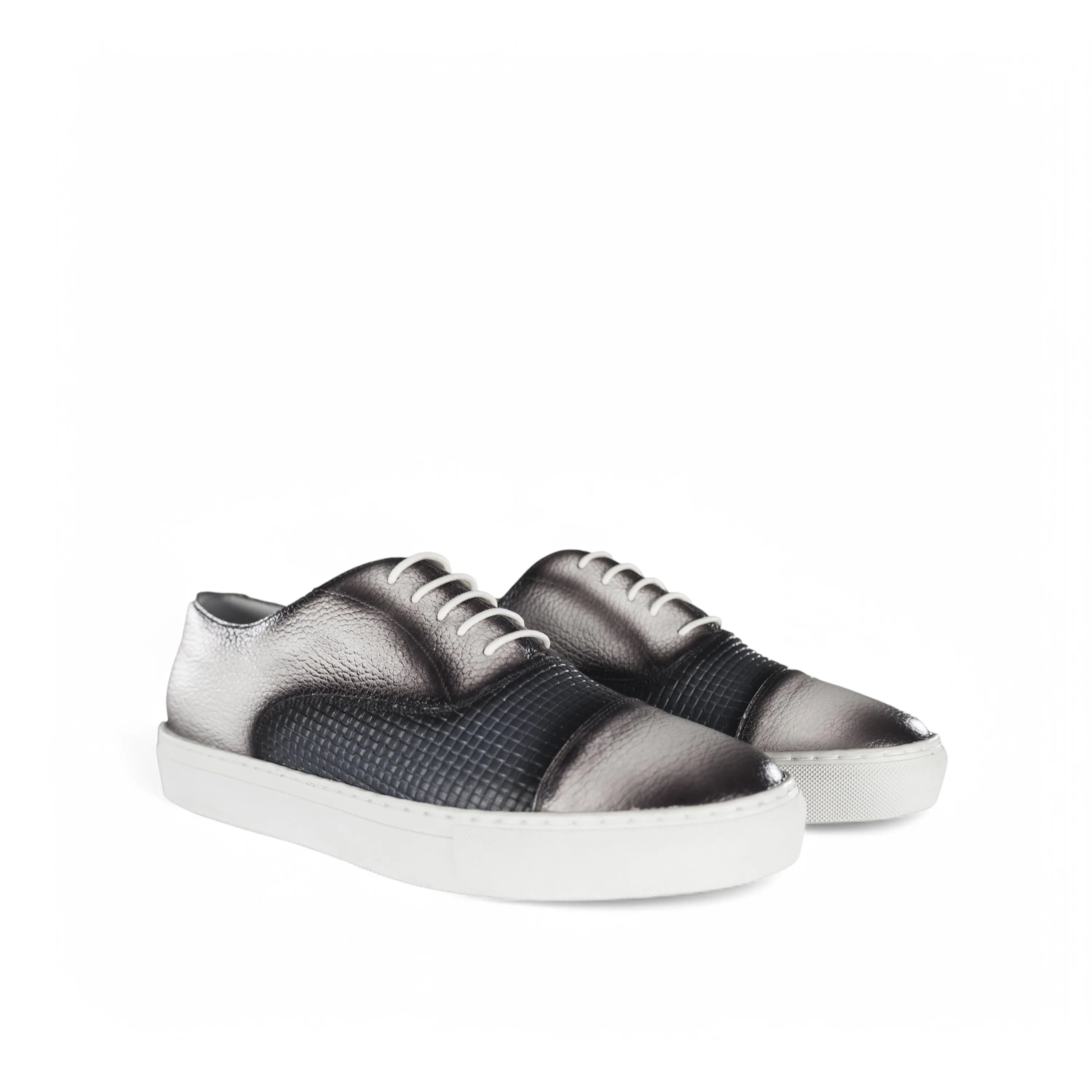 Two-tone leather Olimpia Oxford Sneaker showcasing stylish design and comfort