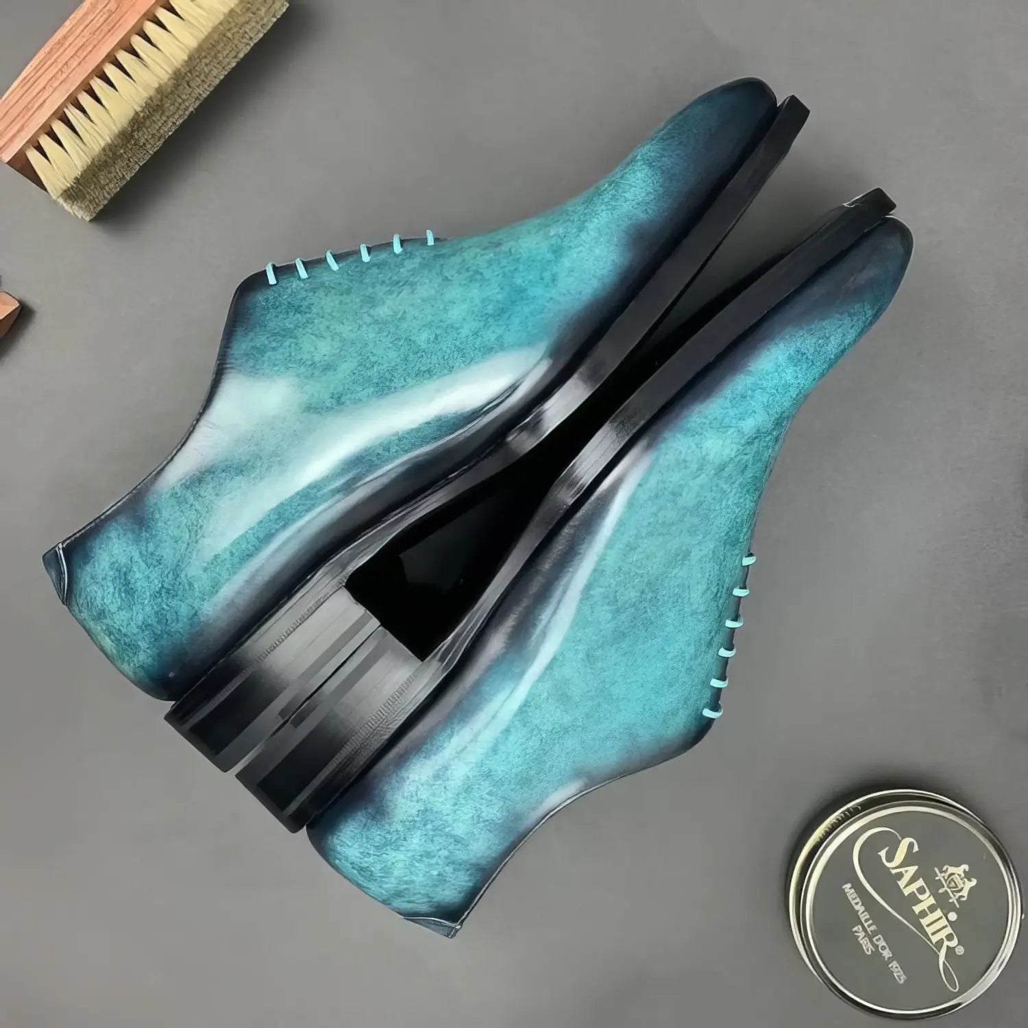 Gradient teal and black patina wholecut oxford shoes with blue stitching