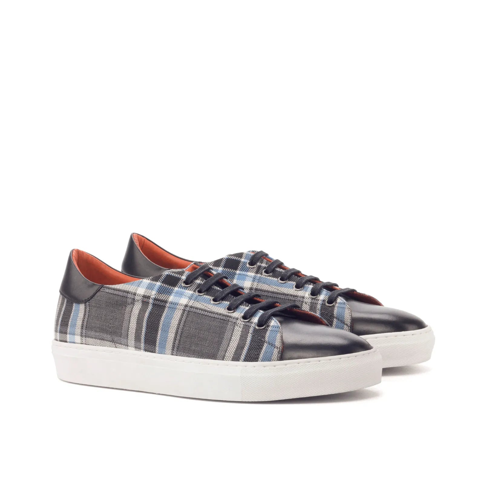 Plaid and leather Pele Trainer Sneaker showcasing stylish cupsole design
