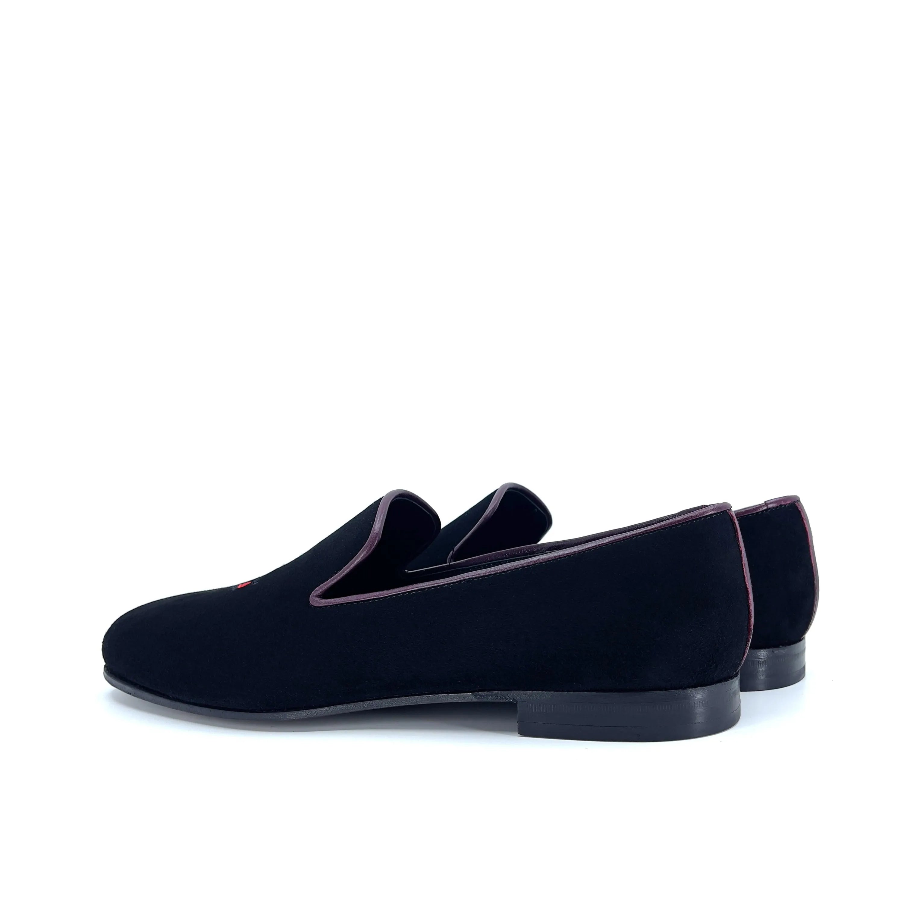 Black velvet loafers featured in the Pete Wellington Slipon collection for elegant style