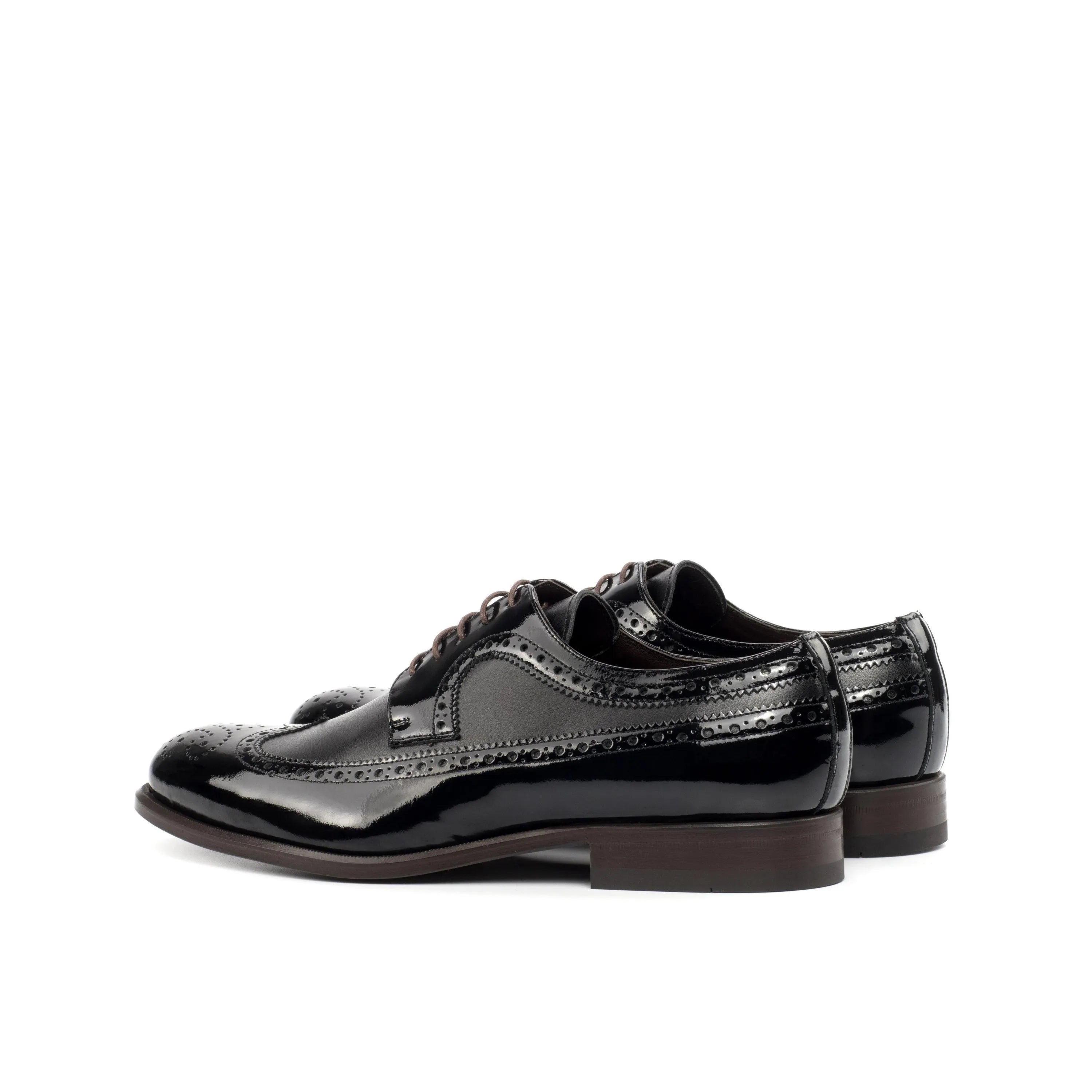 Shiny black Peter Longwing Blucher shoes showcasing elegant long wingtip design