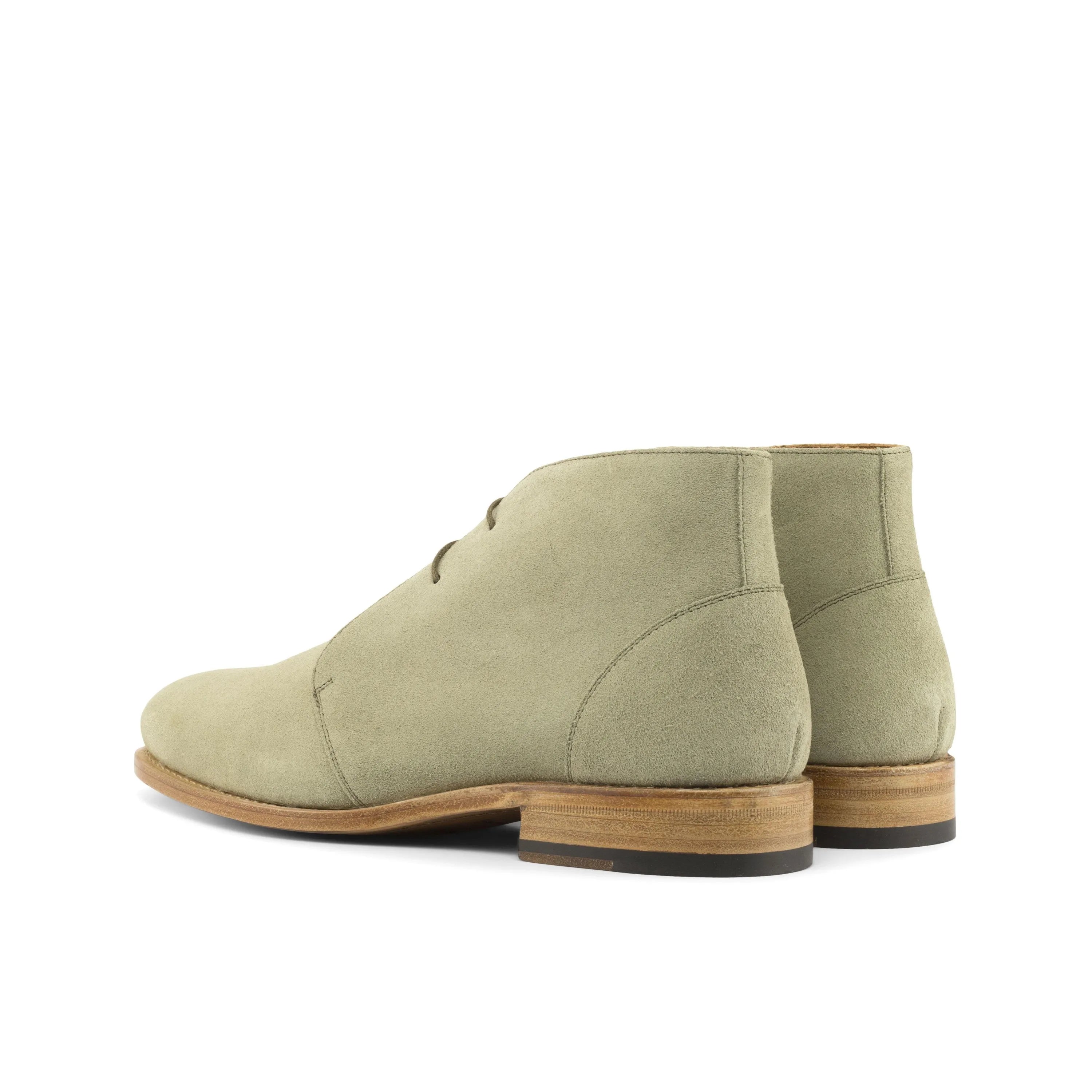 Beige suede Philli Chukka Flex Boots elegantly displayed for optimal styling