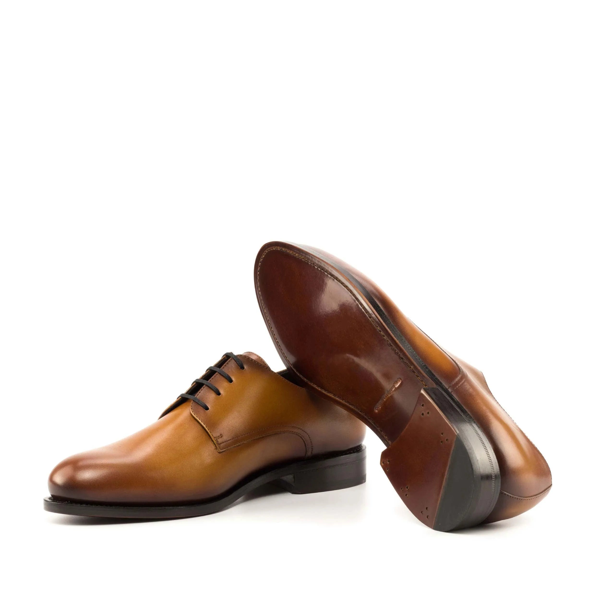 Pair of brown leather dress shoes, featuring Pinardo Derby Shoes for a sophisticated look
