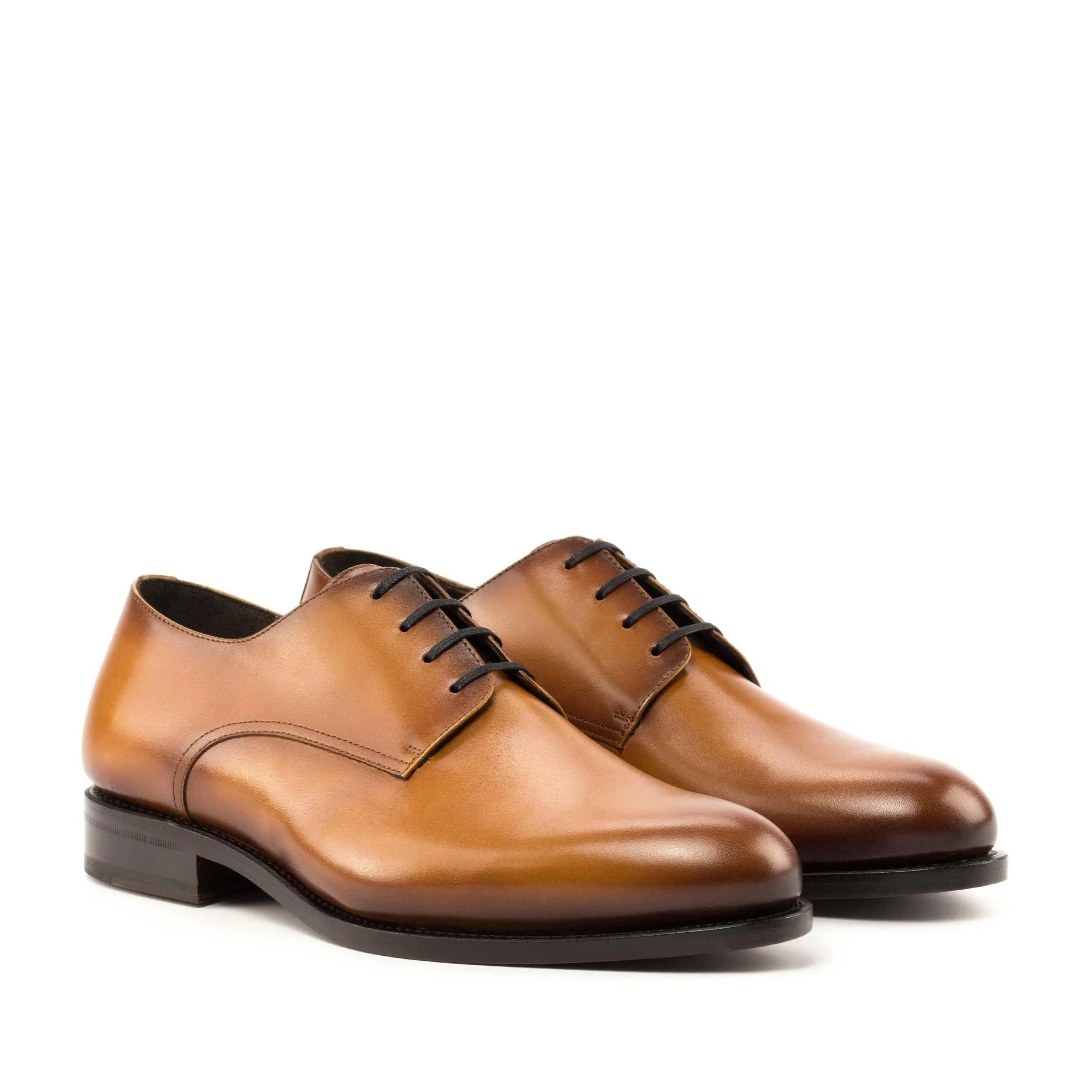 Pair of brown leather dress shoes featuring Pinardo Derby design for the fast lane