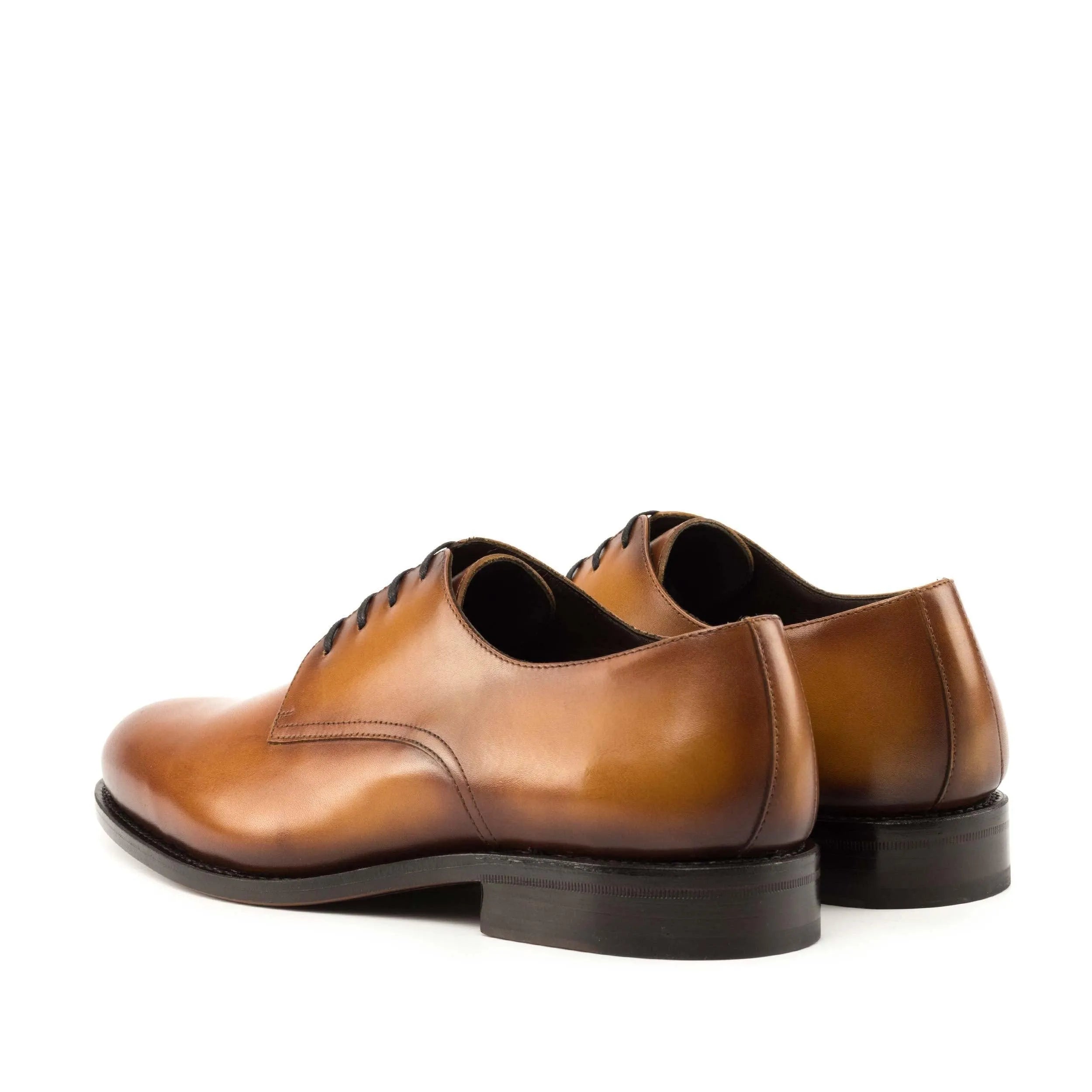Pair of brown leather dress shoes, showcasing Pinardo Derby shoes for the fast lane