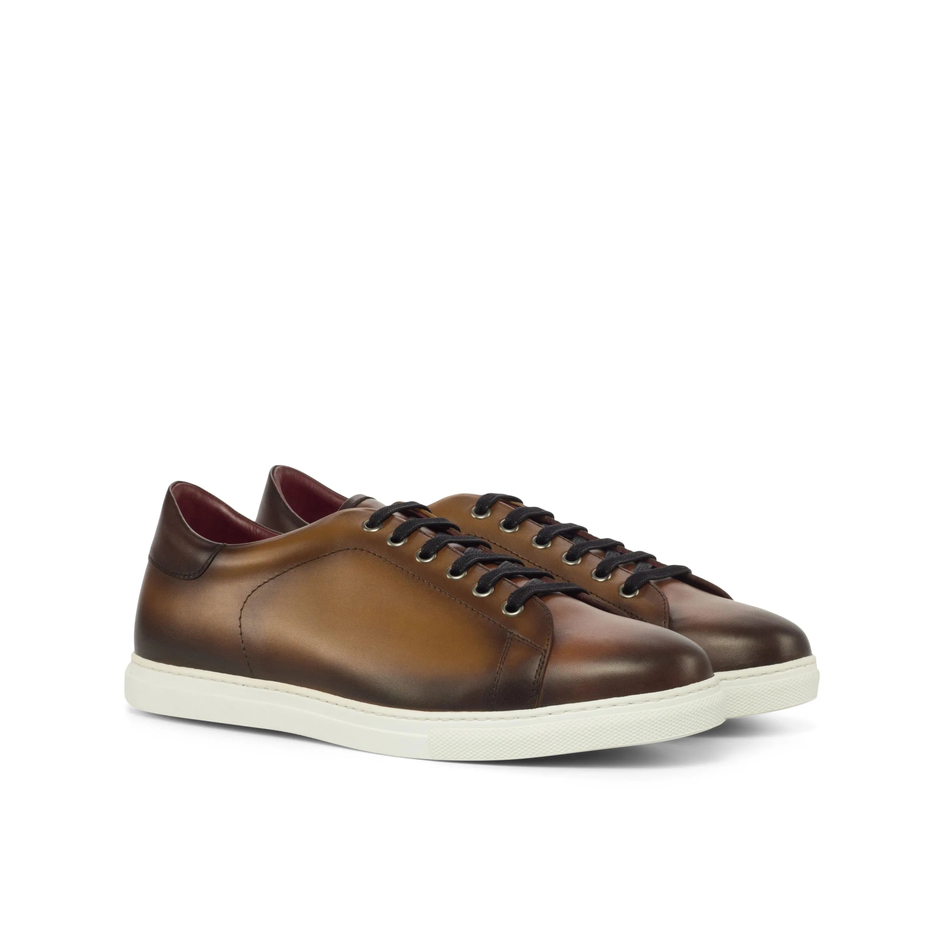 Brown leather sneakers featuring the Porcho Trainer design and cupsole trainer style