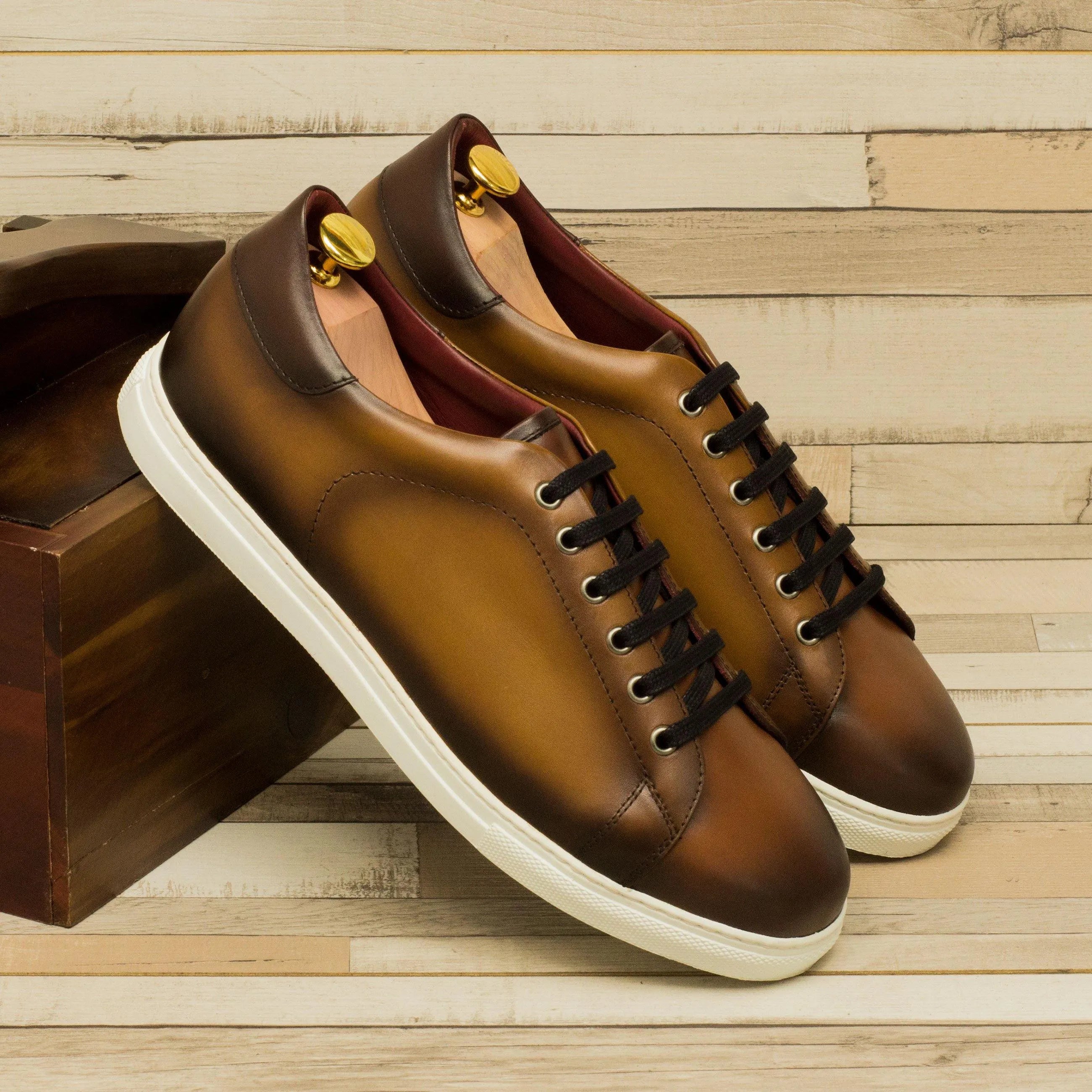 Brown leather Porcho Trainer Sneakers with black laces and a cupsole design