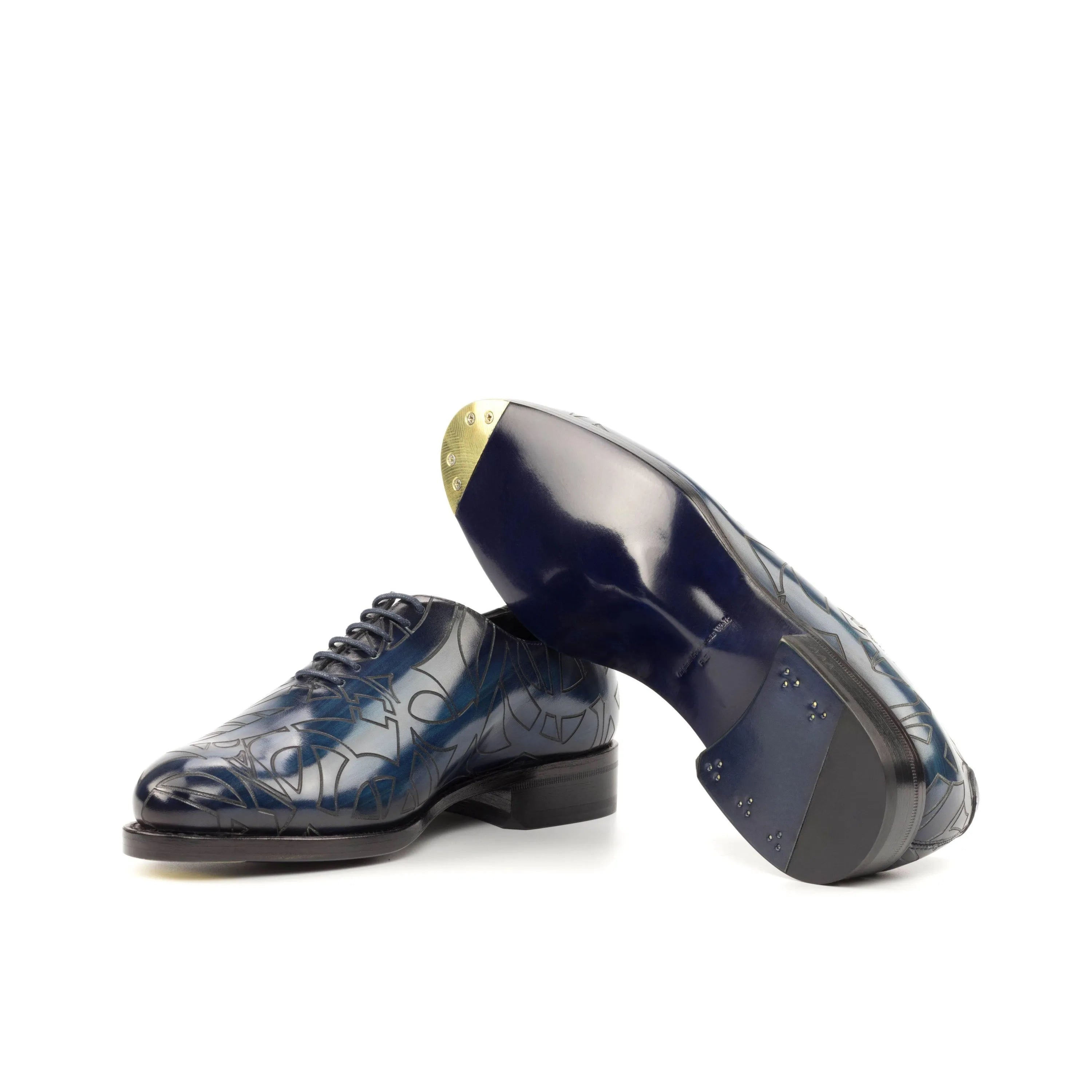 Blue patterned dress shoes featuring patina wholecut design in Italian crust leather