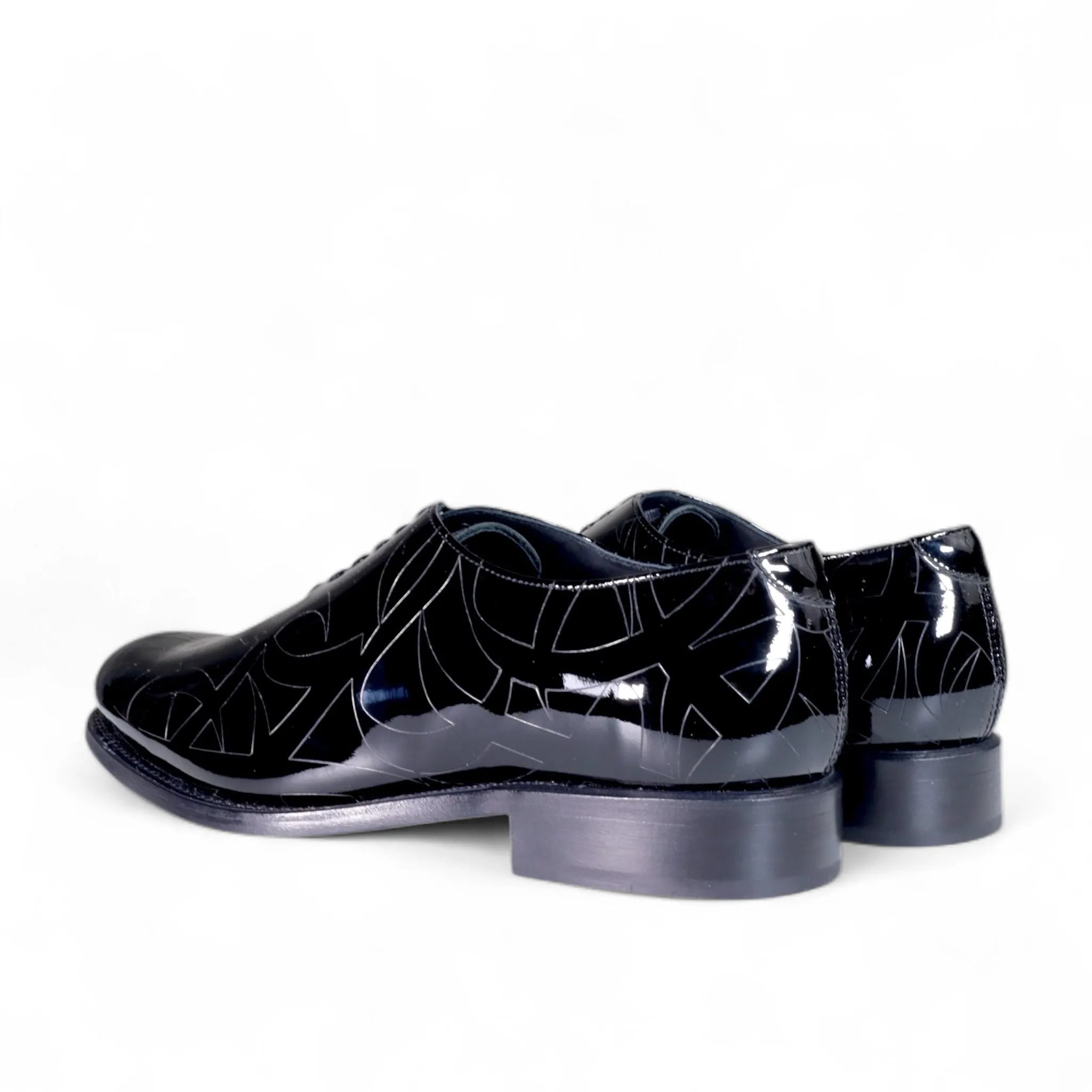 Black patterned patent leather Quswa Noir Wholecut Shoes from the Cleopatra edition