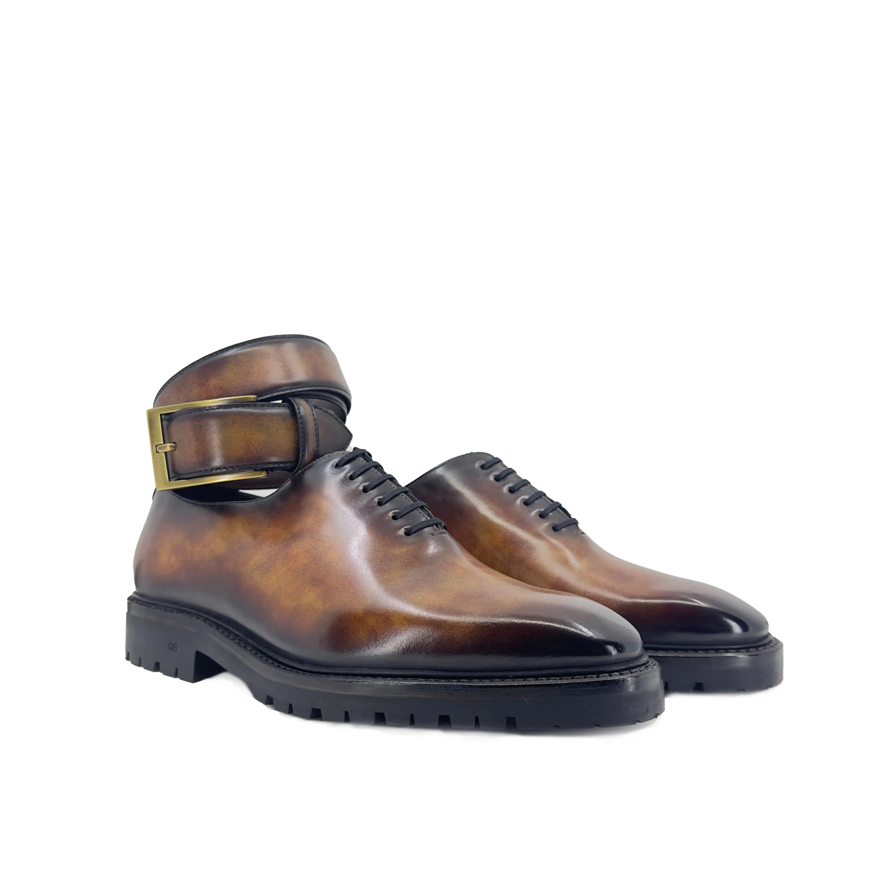 Brown leather buckled Raigon Patina Wholecut shoes displayed as a sample product