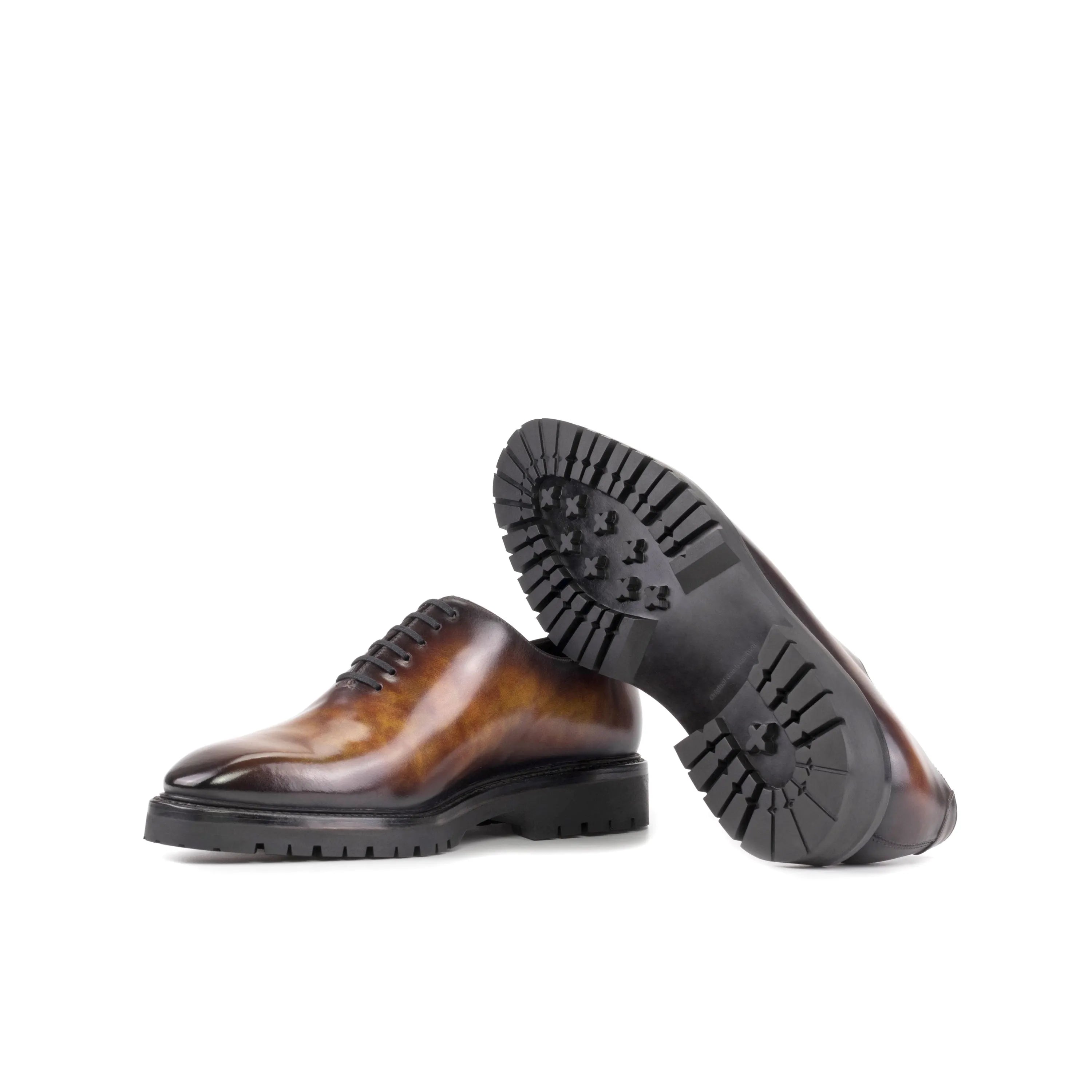 Brown leather Raigon Patina Wholecut shoes with lug soles for stylish durability