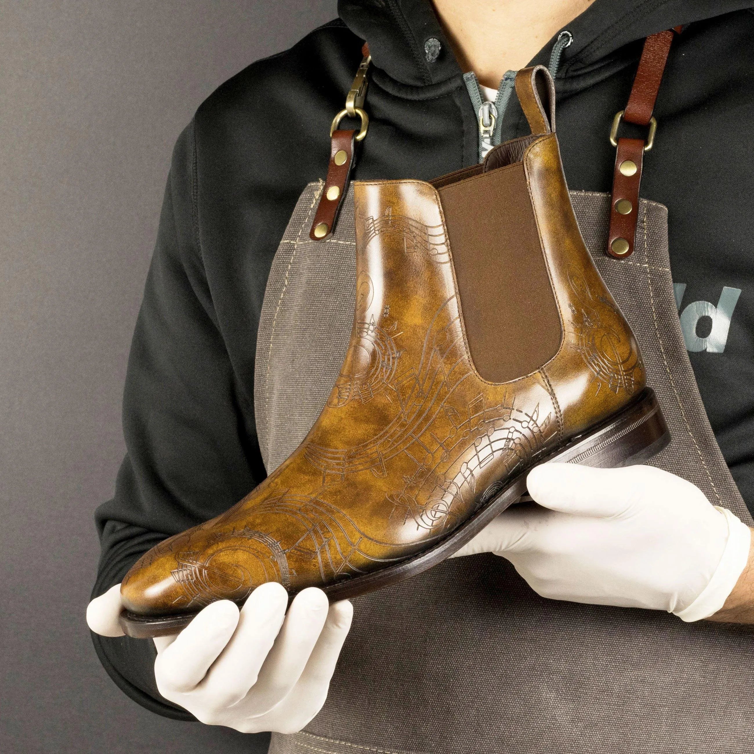 Brown leather Rob Patina Chelsea Boots II showcasing elegant museum patina design