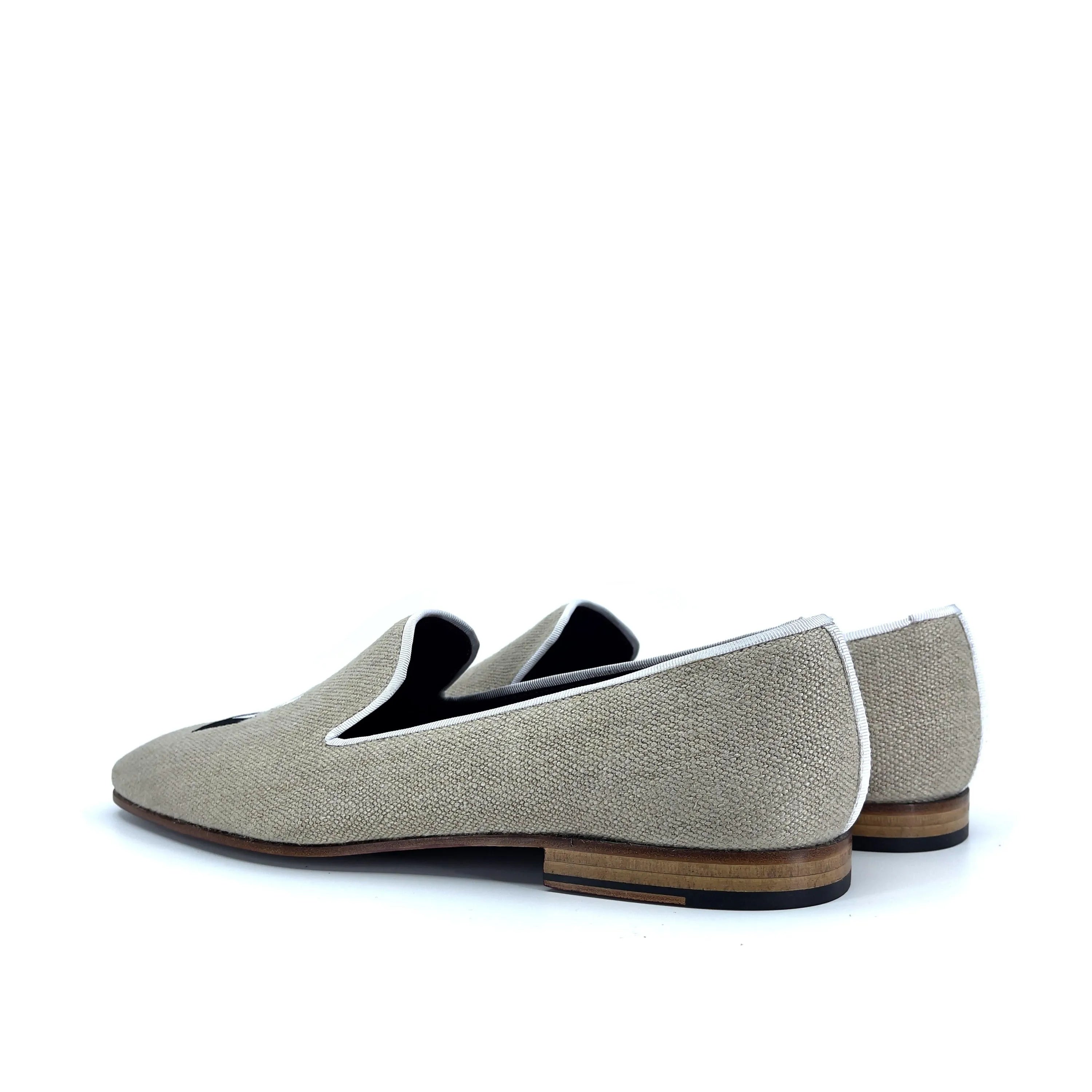 Beige linen loafers showcased in Roger Drake slipon footwear collection