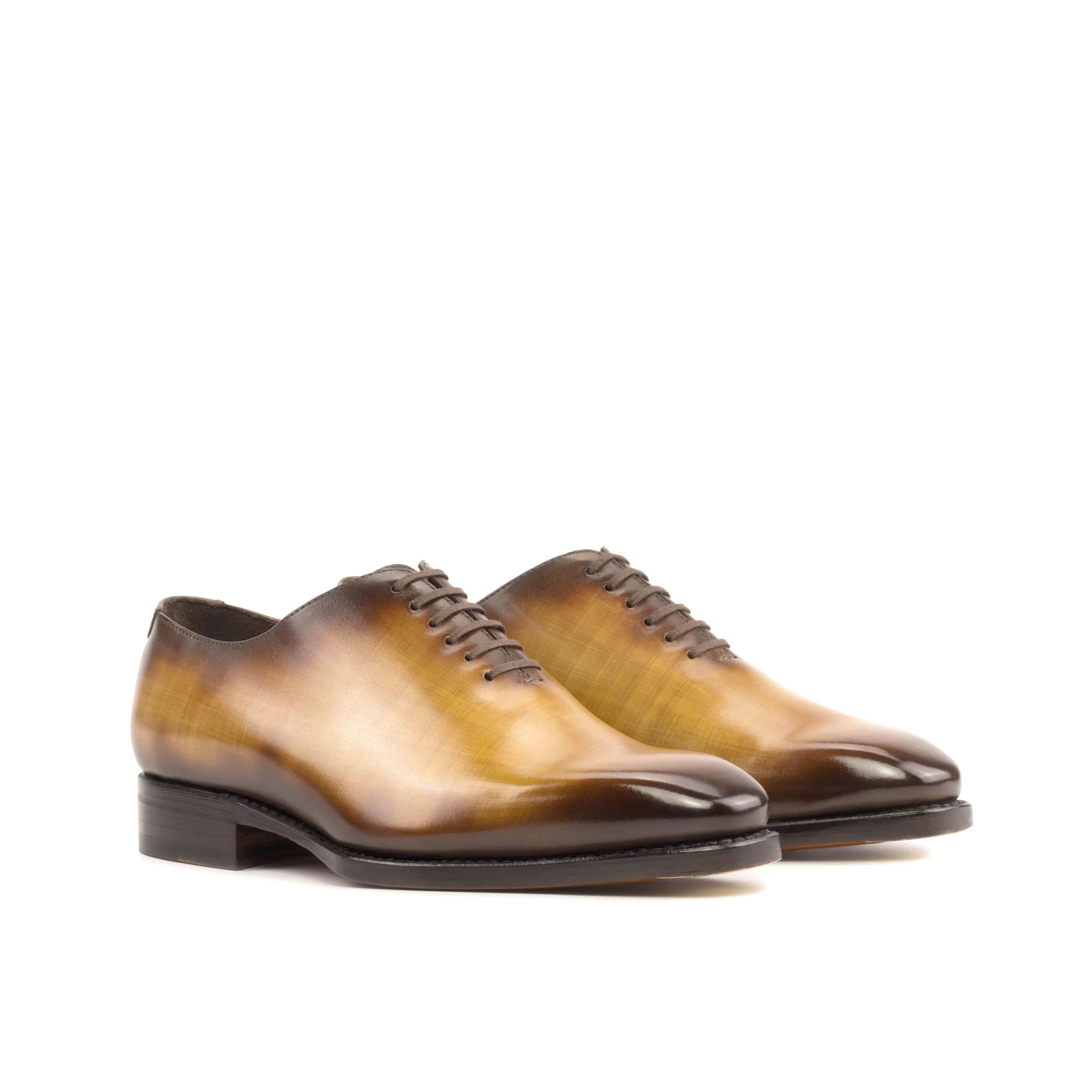 Men’s brown leather dress shoes, showcasing Rosewood Patina Wholecut design and elegance