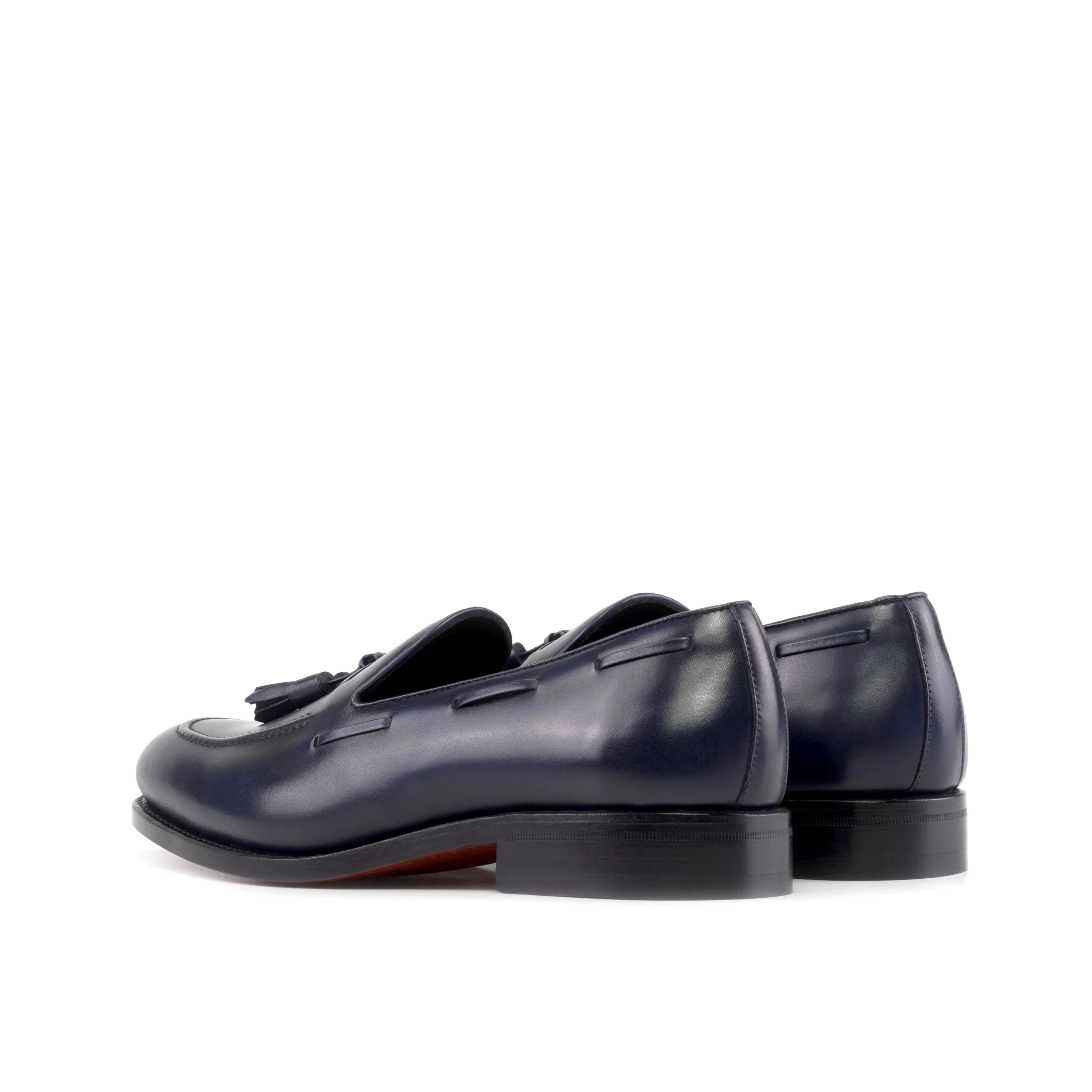 Pair of navy blue leather tassel loafers from Sable Loafers for the fast lane of business days