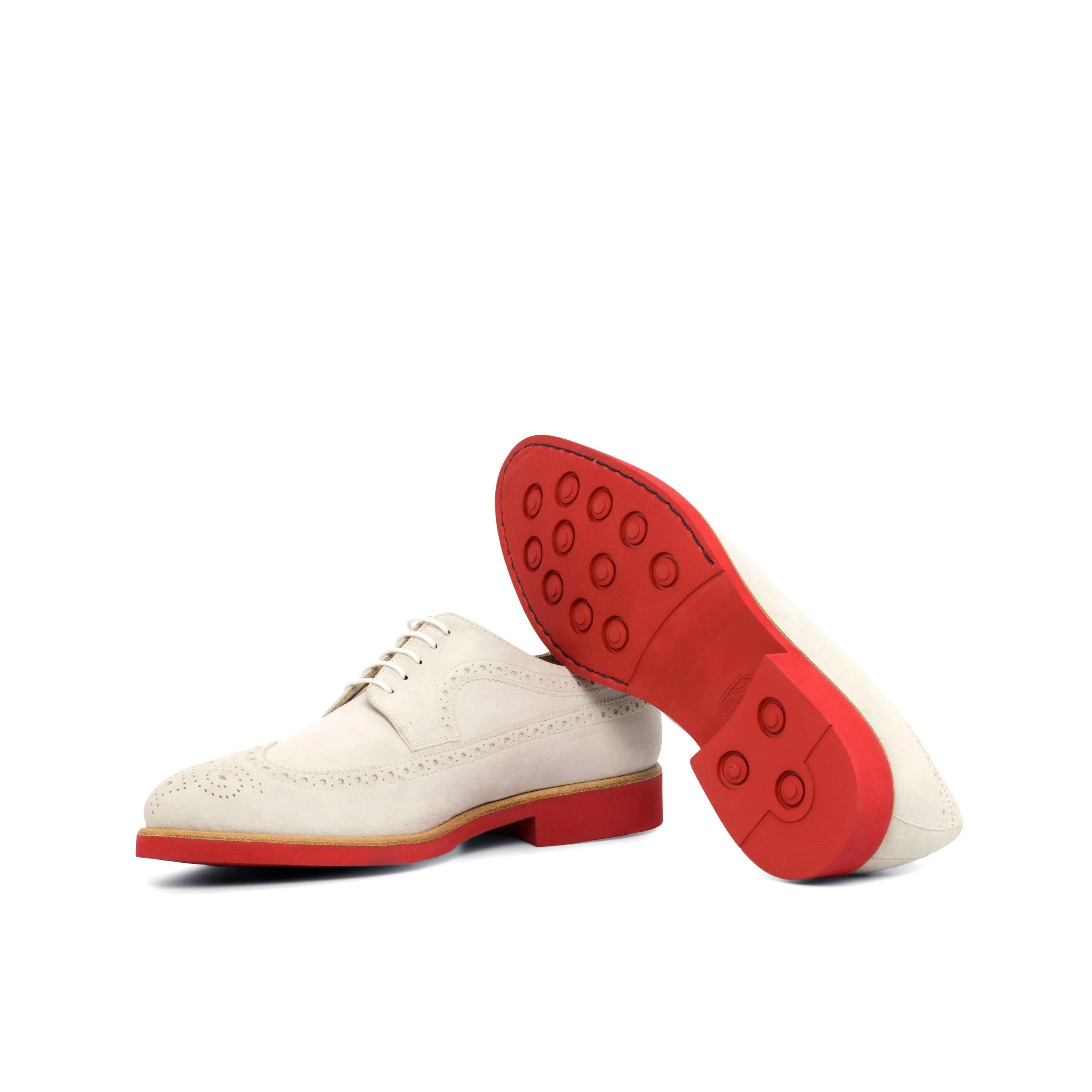 White suede wingtip shoes with red soles from Saidy Longwing Blucher II collection