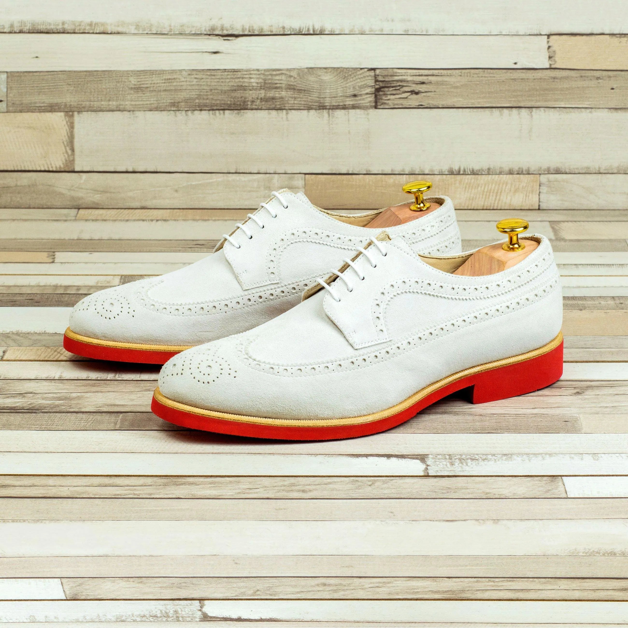 White suede Said Longwing Blucher shoes showcasing elegant wingtip design