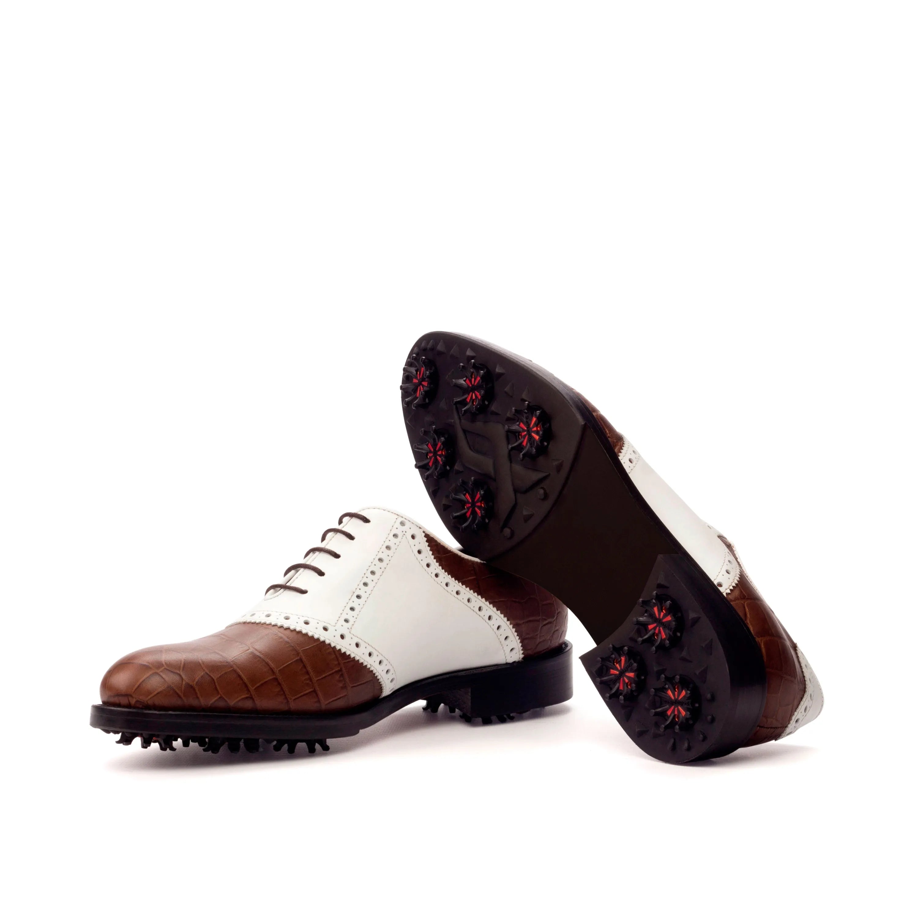 Brown and white Salvador golf shoes with spikes designed for optimal performance