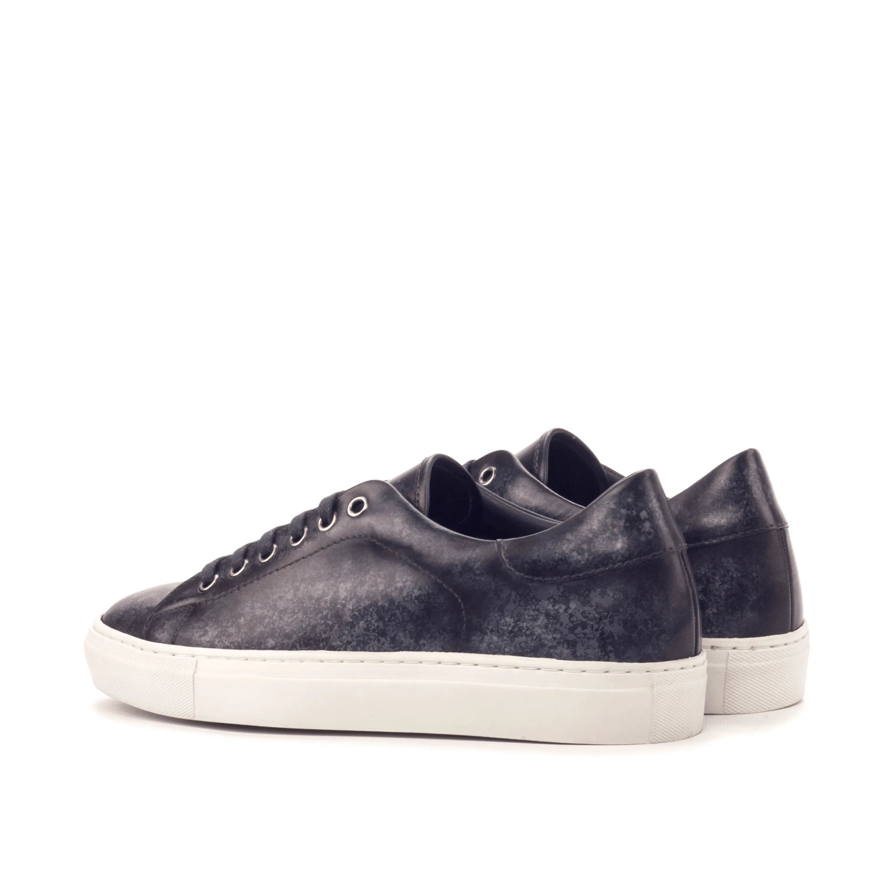 Pair of Sancho Trainer Patina Sneakers in dark leather with white cupsole