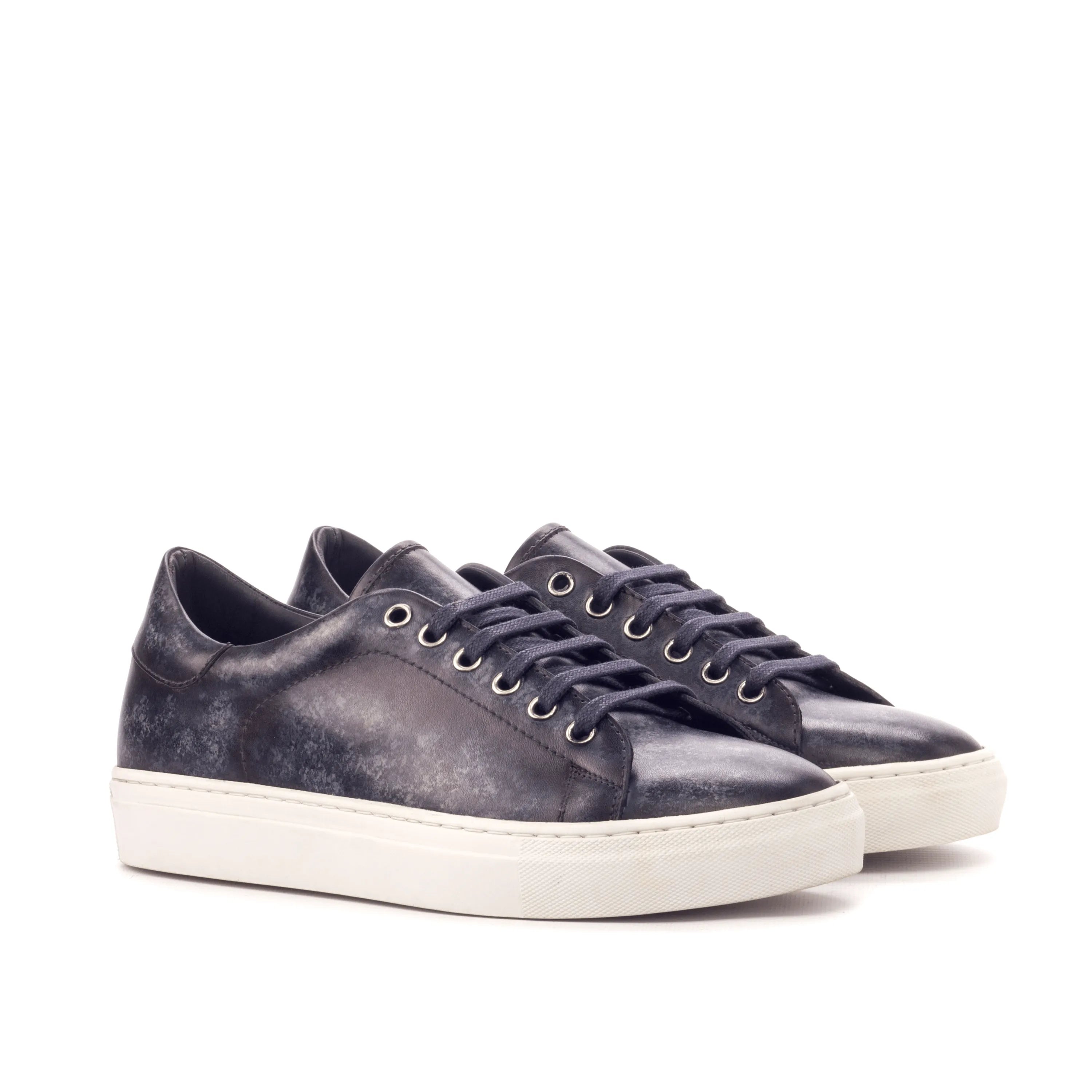 Pair of Sancho Trainer Patina sneakers in black leather with cupsole design
