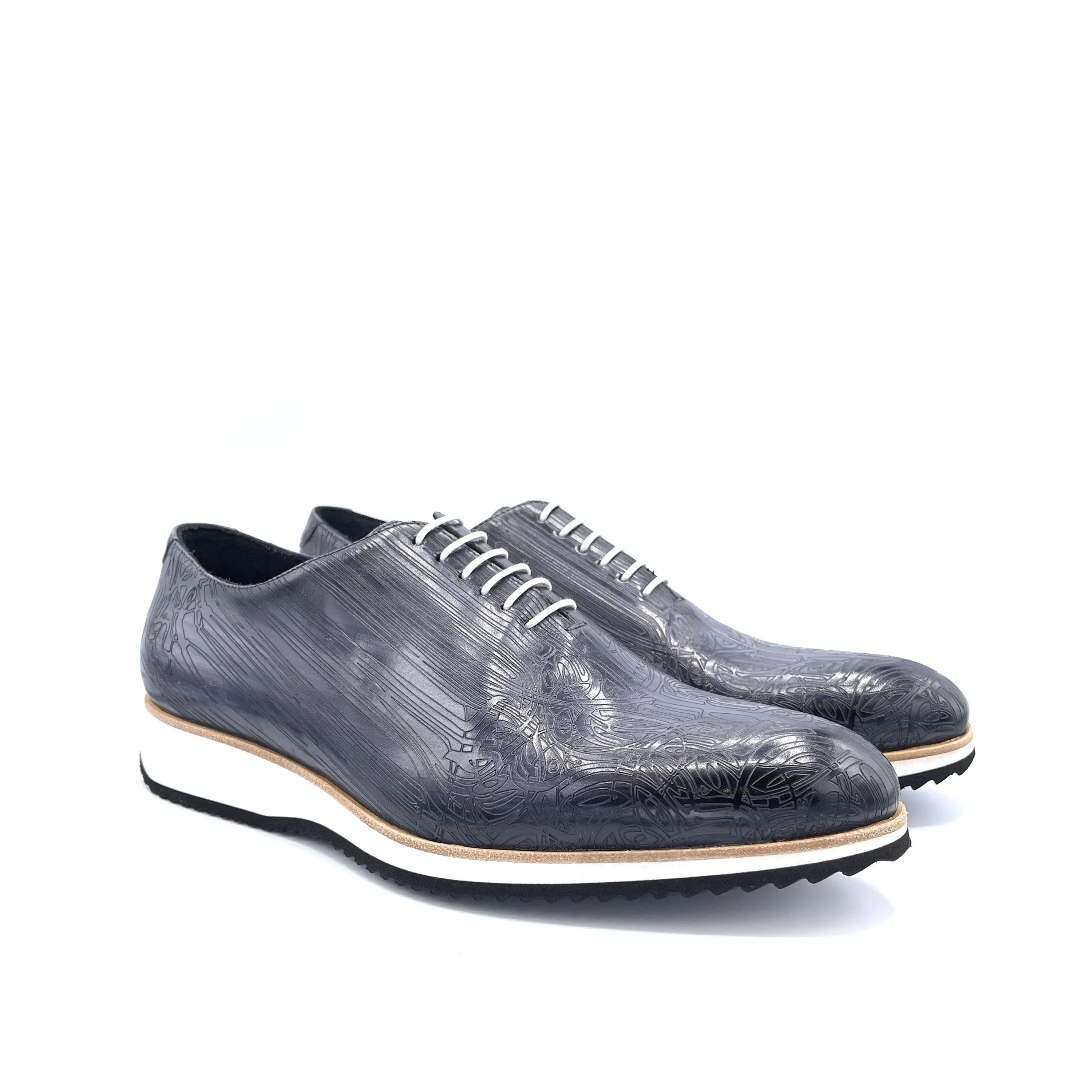 Gray leather dress shoes in Script 2 Patina Wholecut made from Italian crust leather