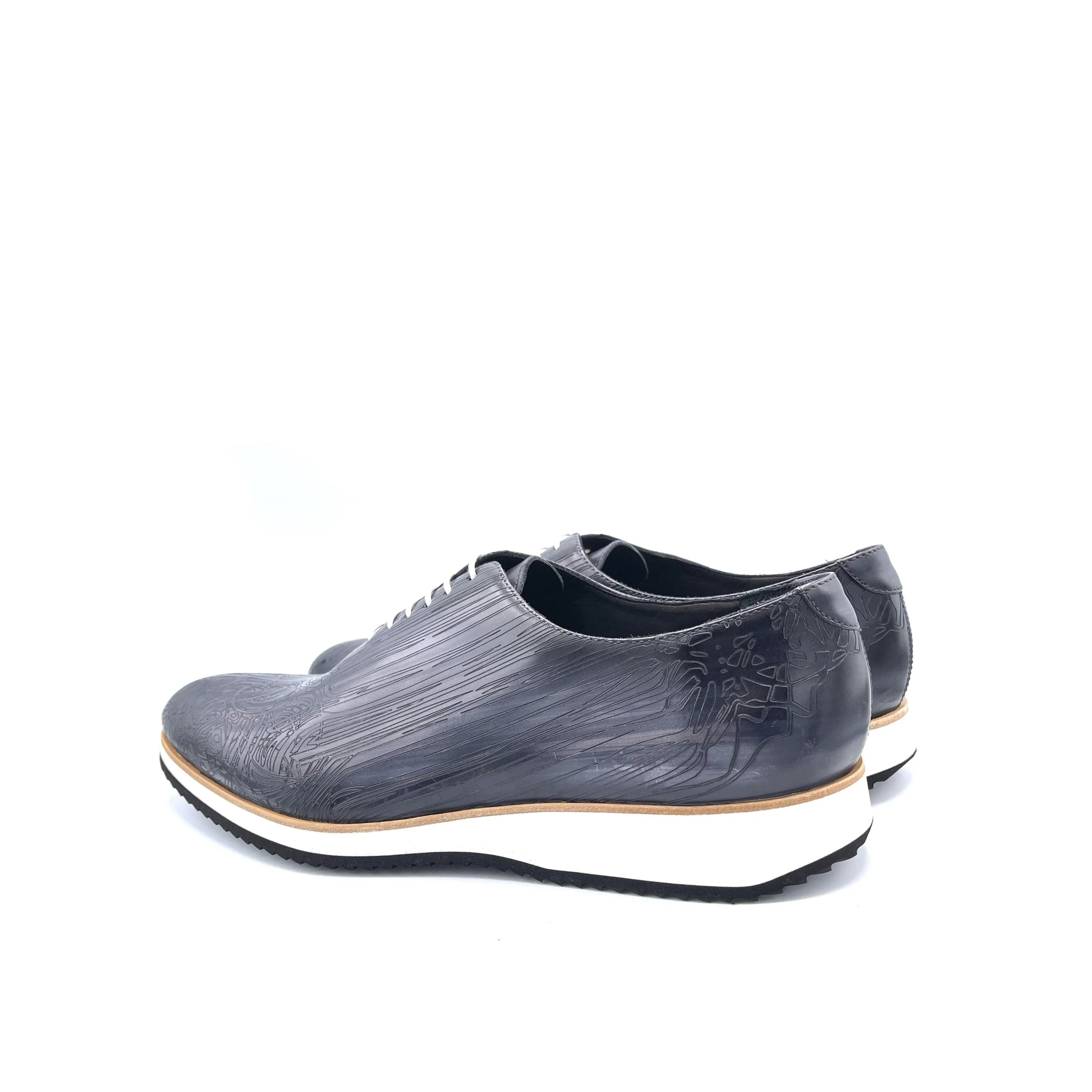 Gray leather dress shoes in Italian Crust Leather featuring a refined Patina Wholecut design