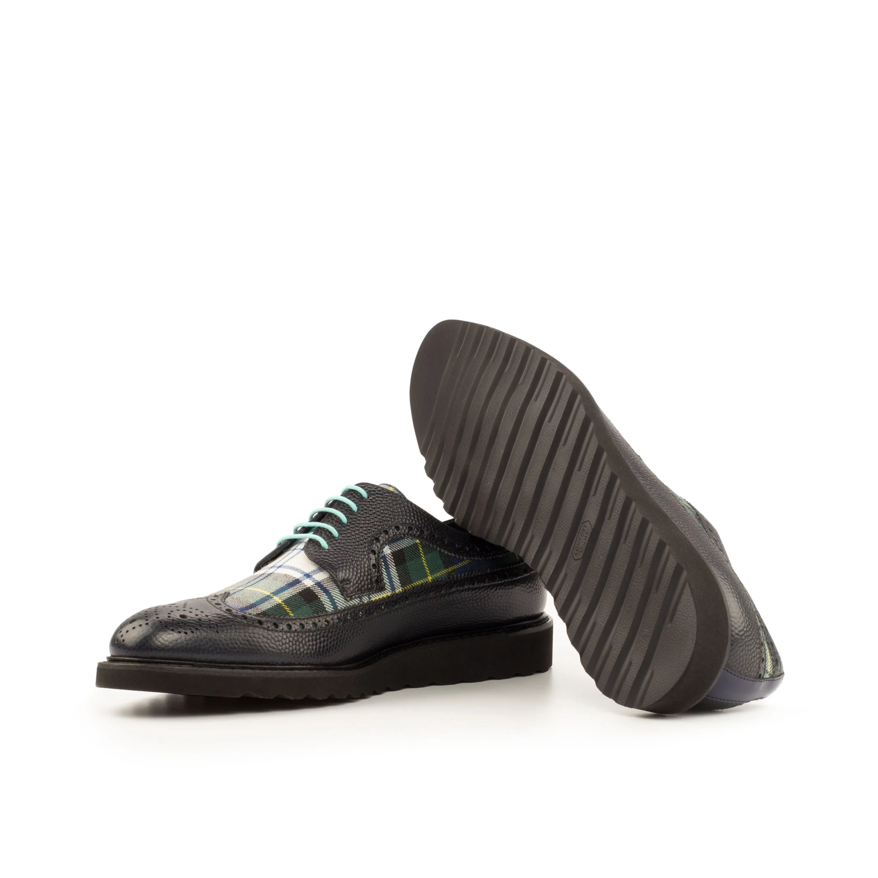 Black leather and plaid wingtip shoes from Seleucid Longwing Blucher collection