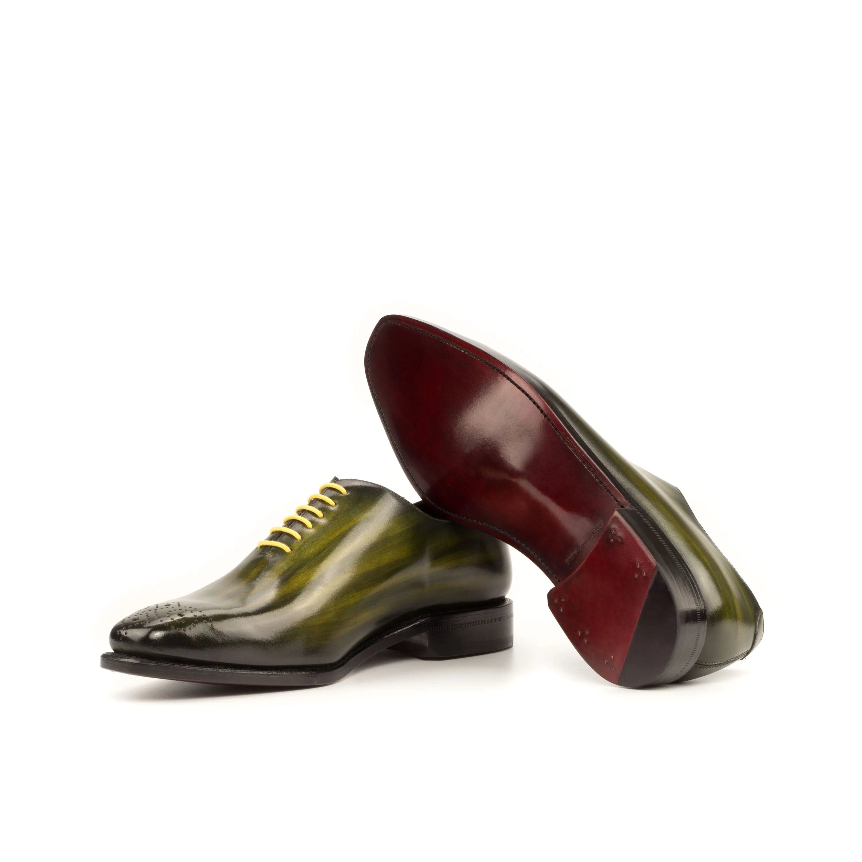 Green leather Serb Whole Cut Patina shoes showcasing exquisite cut patina craftsmanship