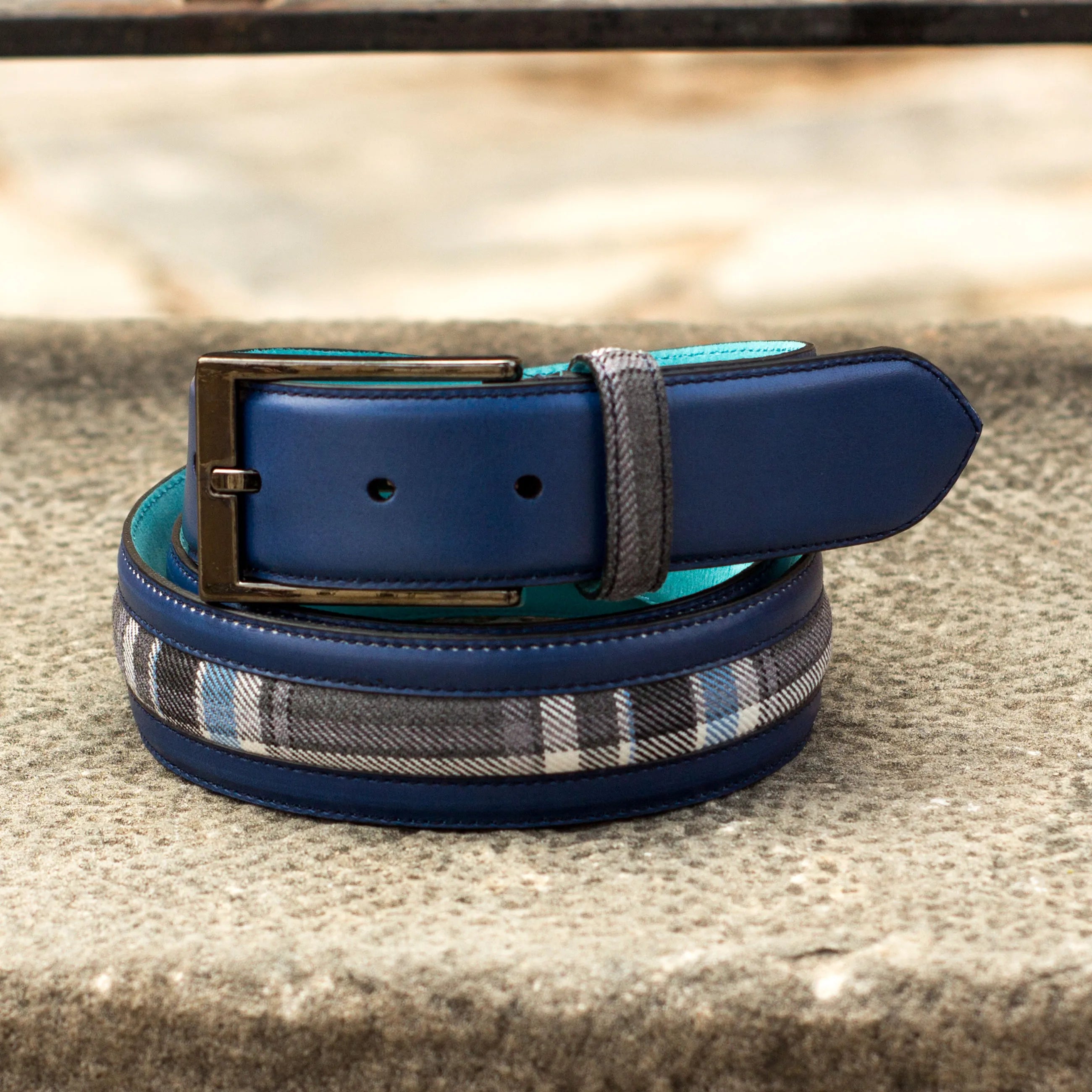 Blue leather and plaid design of the Sextus Venice Belt, showcasing elegant craftsmanship