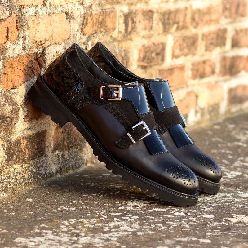 Pair of black leather Shiv Kiltie Unisex Monk Strap II shoes for stylish unisex wear