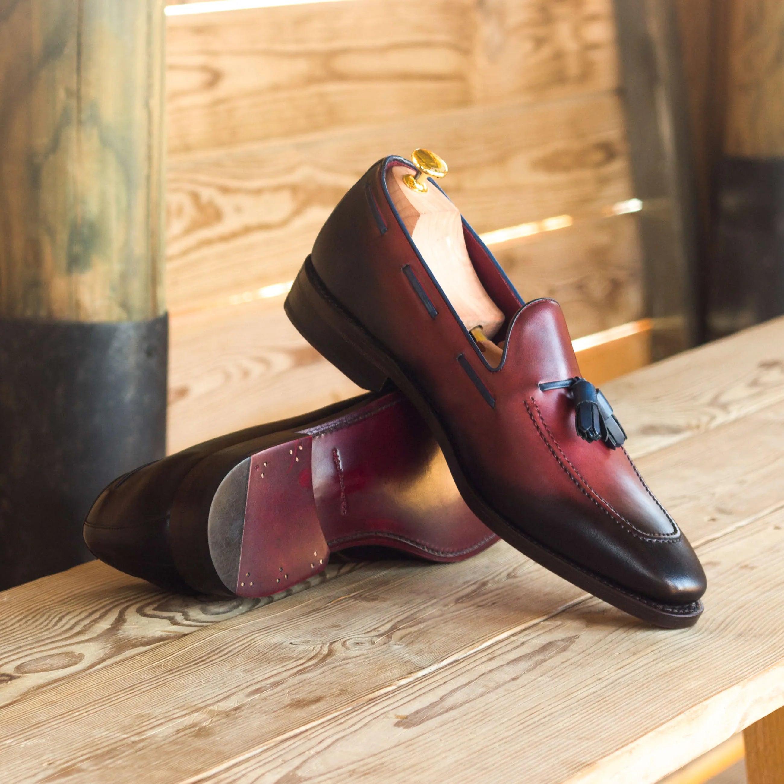 Burgundy and black leather tassel loafers from Silwauski, luxury bespoke shoes for men