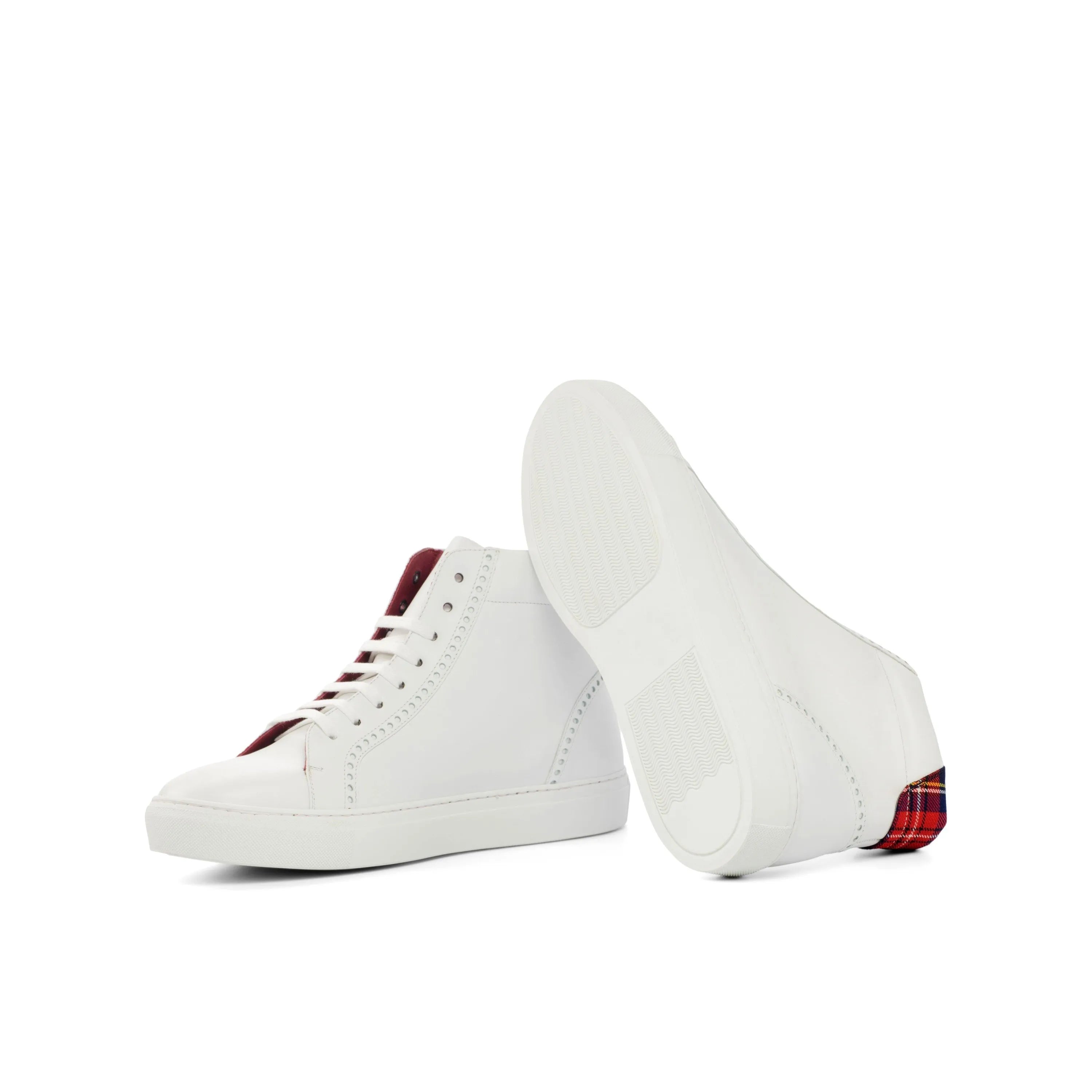 Pair of white high-top sneakers from Sky High Kicks for stylish comfort