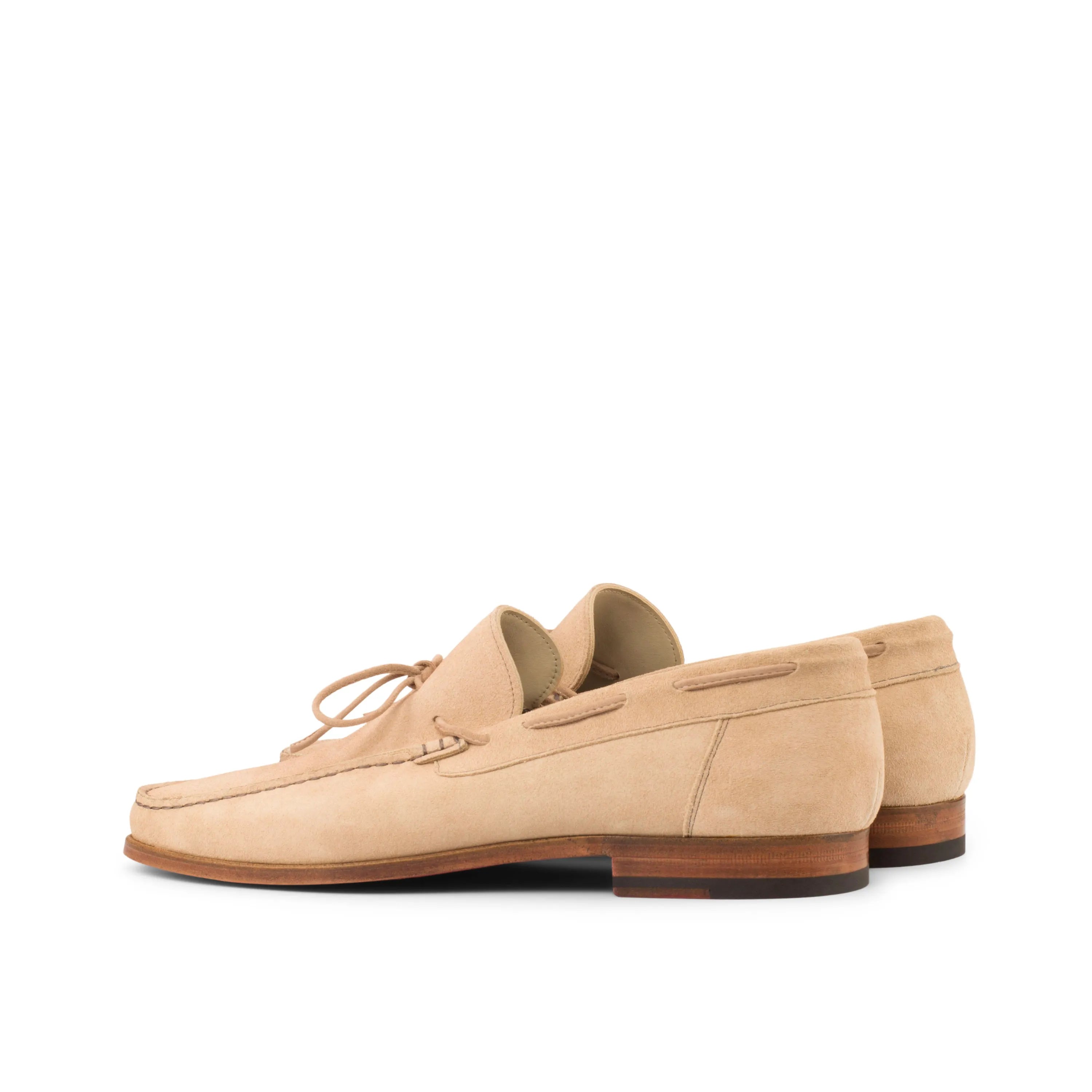 Beige leather loafers from Soleil Moccasin, a luxury bespoke shoe for men