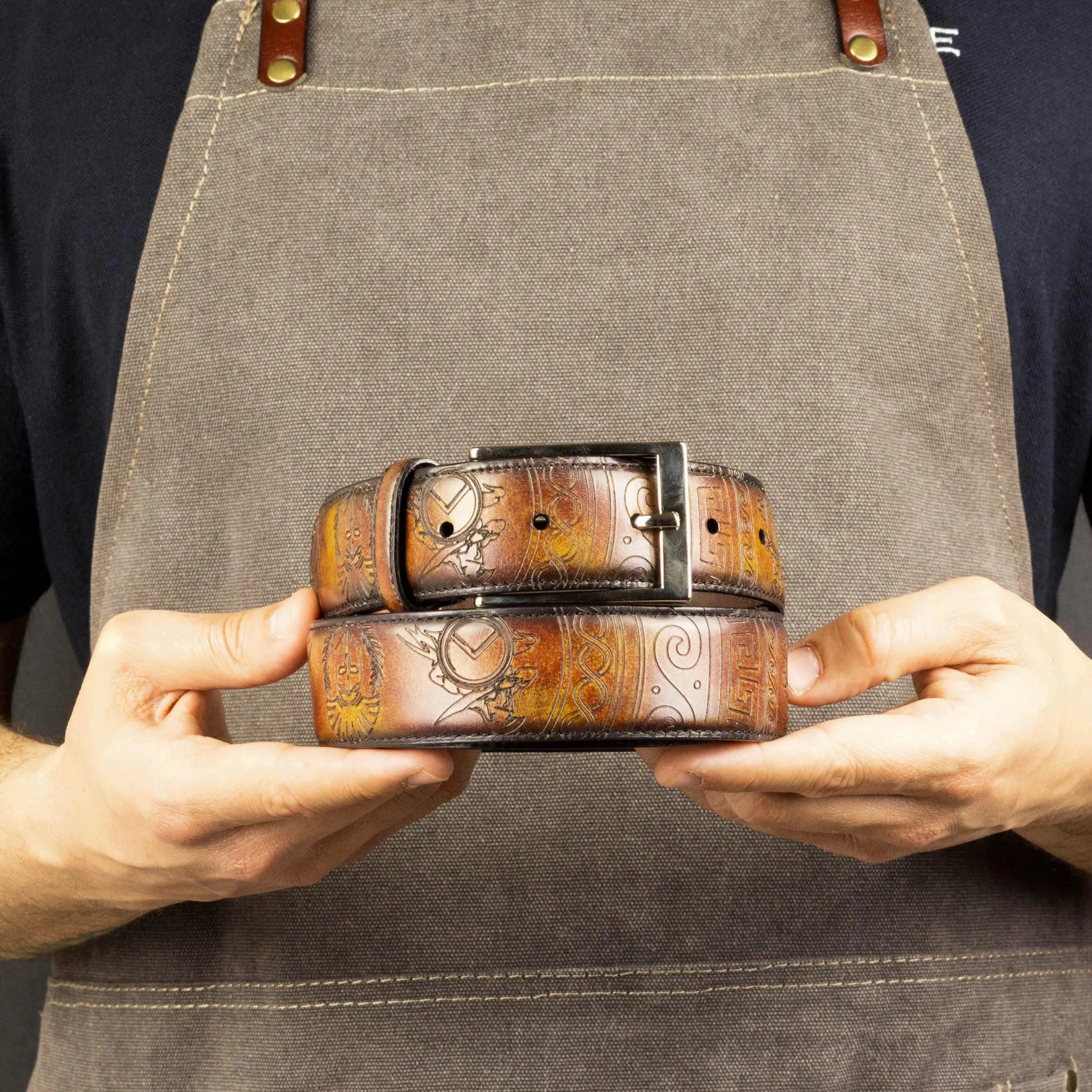 Brown leather Spartan Patina Hamptons Belt featuring an intricate clockwork design