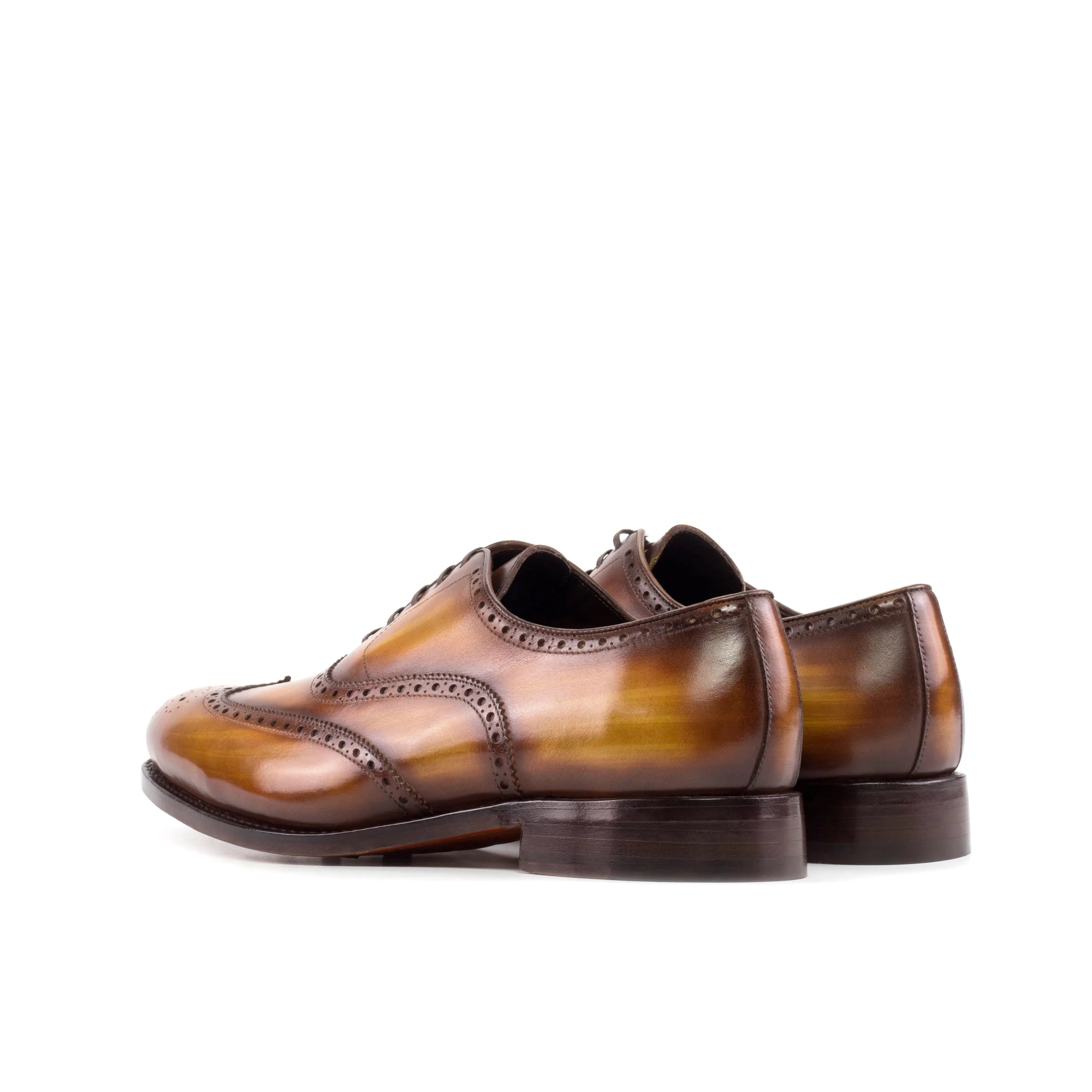 Brown leather wingtip dress shoes, showcasing Spectral Patina full brogue shoes design
